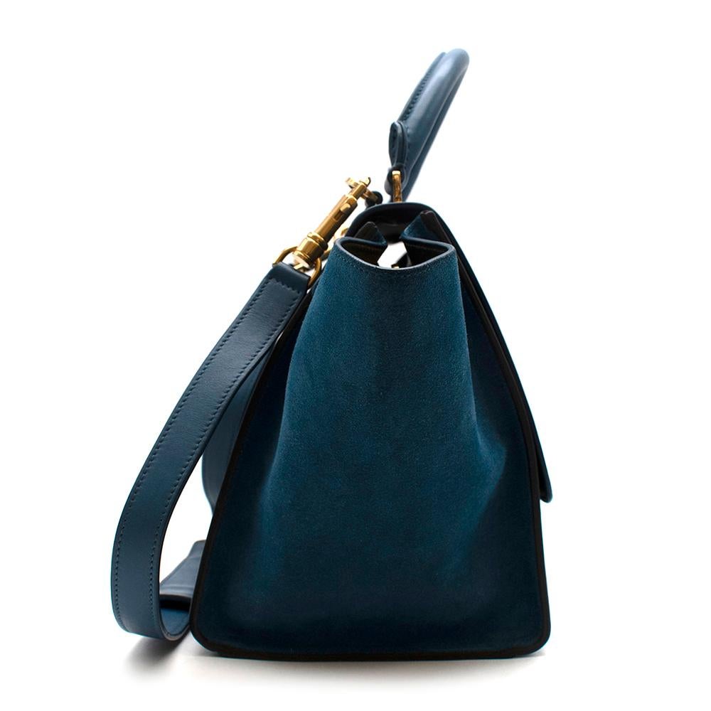 Celine Blue & Black Suede Leather Trapeze Bag

-Celine by Phoebe Philo
-Made of soft leather and suede
-Single rounded top handle
-Adjustable detachable shoulder strap
-Foldover top
-Flip-lock fastening
-Top zip fastening
-Internal patch