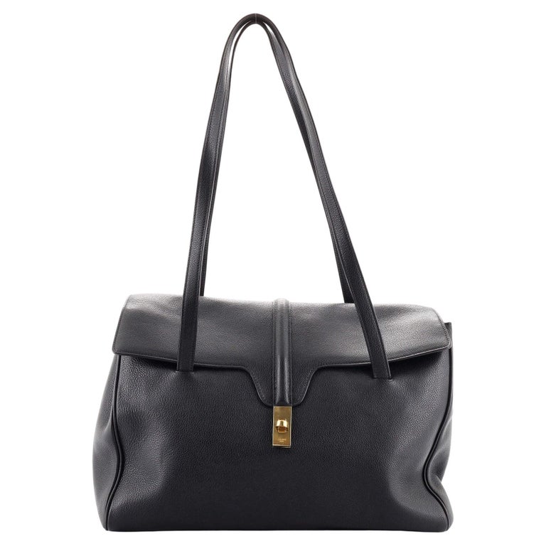 Prada Black Leather Silver Loop Top Handle Bag at 1stDibs