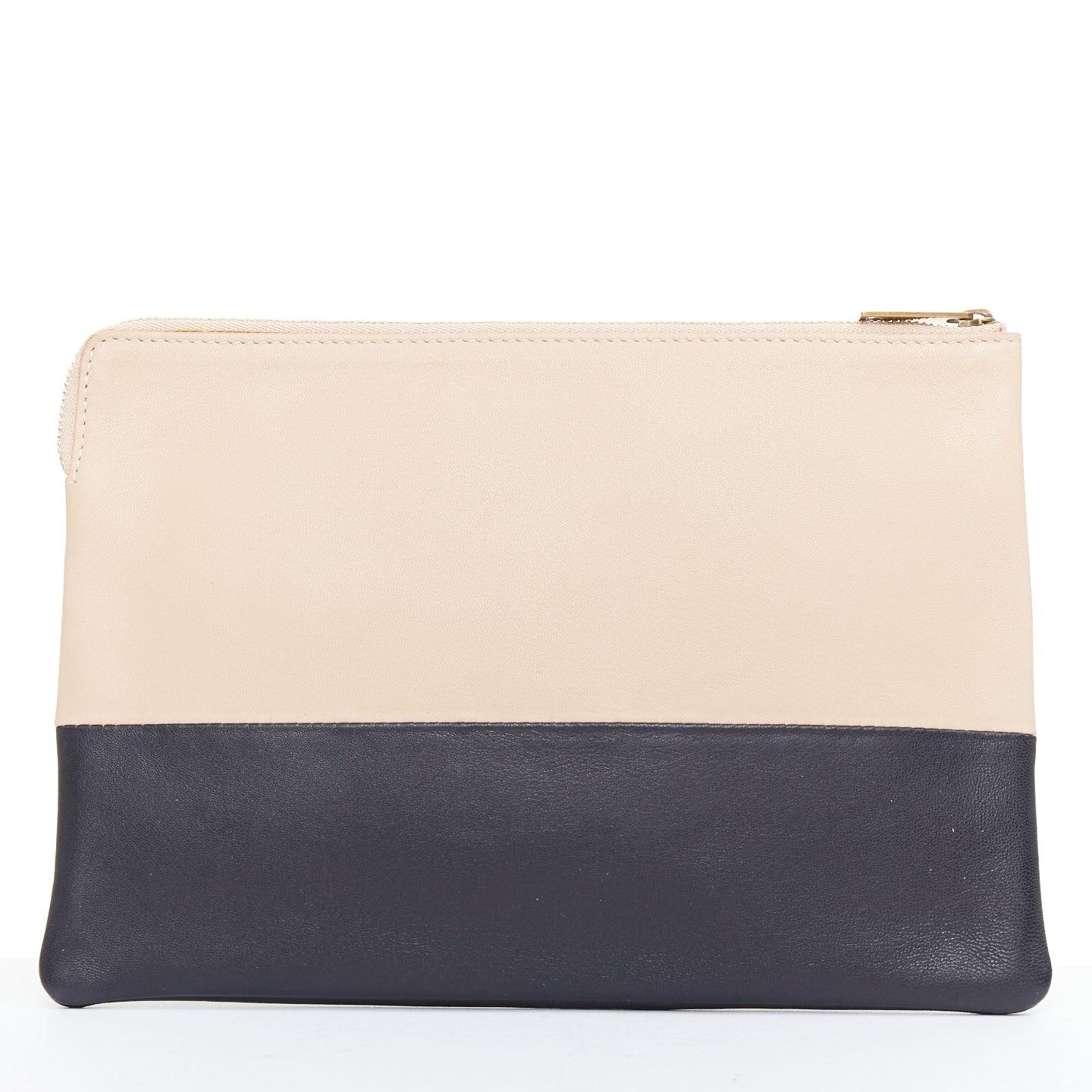 CELINE Solo beige black bicolor smooth leather gold logo pouch clutch In Good Condition For Sale In Hong Kong, NT