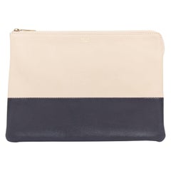 Pochette CELINE Solo beige nero bicolore in pelle liscia con logo oro