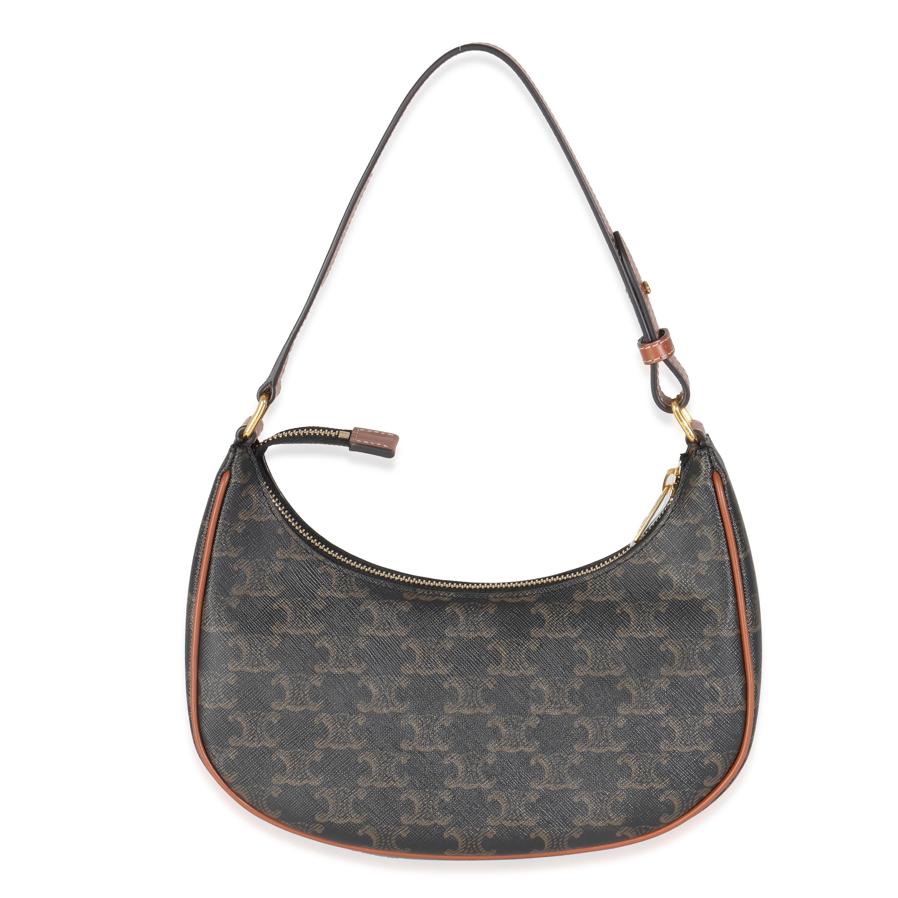 Listing Title: Celine Tan Calfskin Triomphe Canvas Ava Shoulder Bag
SKU: Z145058
MSRP: 1700.00 USD
Condition: Pre-owned 
Handbag Condition: Pristine
Condition Comments: Item has no indication of wear.  Plastic along zipper pull. Final sale.
Brand: