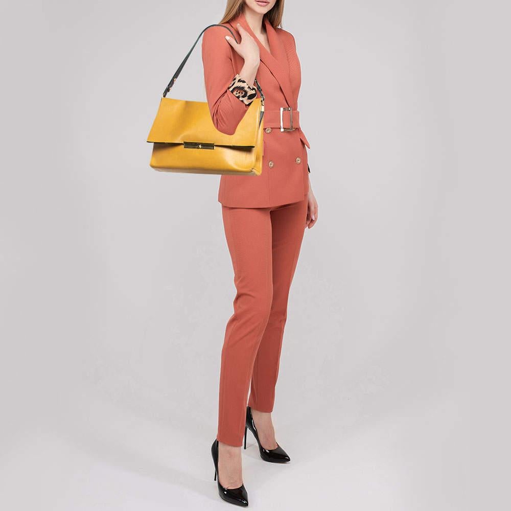 Designer bags are ideal companions for ample occasions Here we have a fashion meets functionality piece crafted with precision. It has been equipped with a well sized interior that can easily fit your small essentials.
