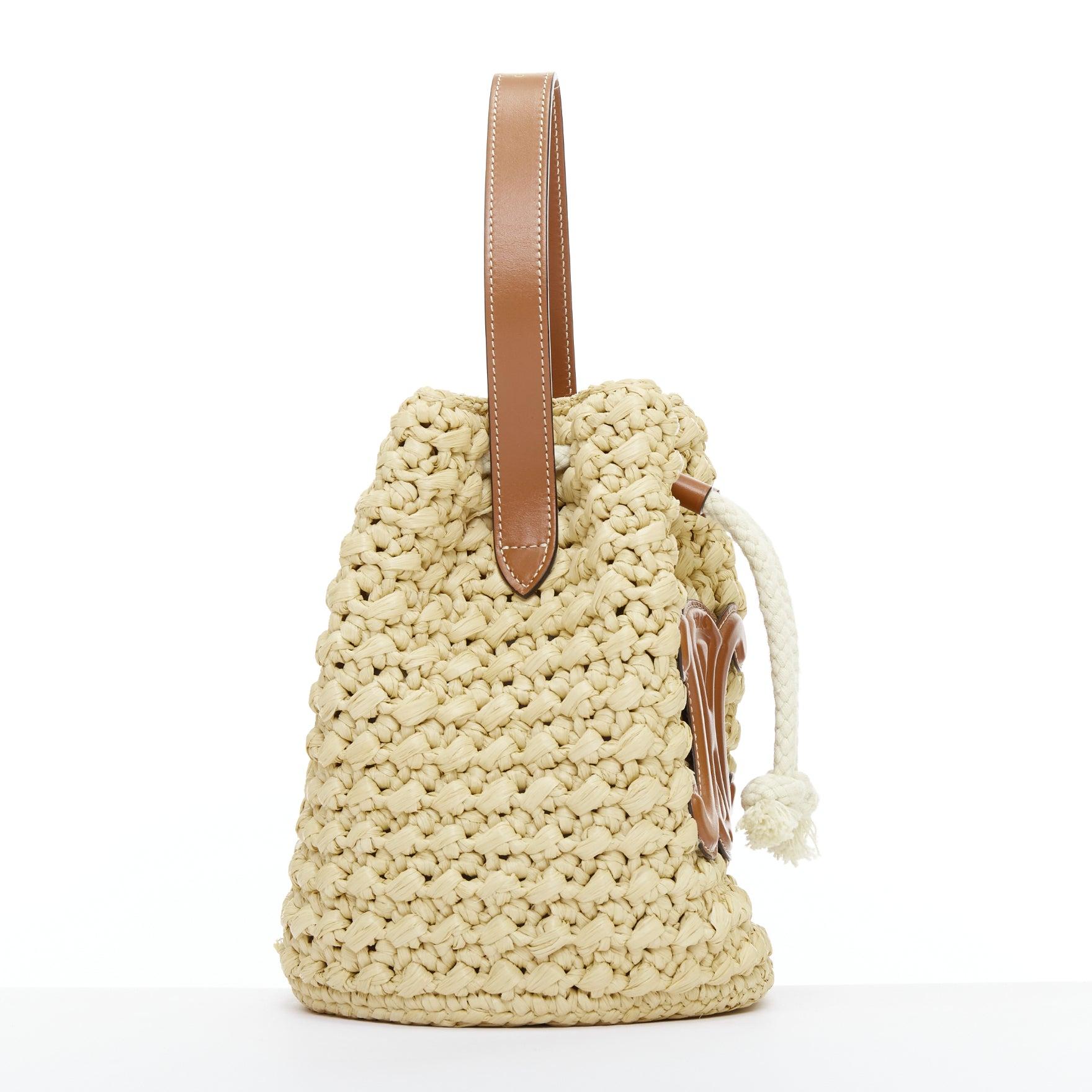 CELINE Teen Triomphe brown leather logo beige raffia drawstring bucket bag In Excellent Condition In Hong Kong, NT