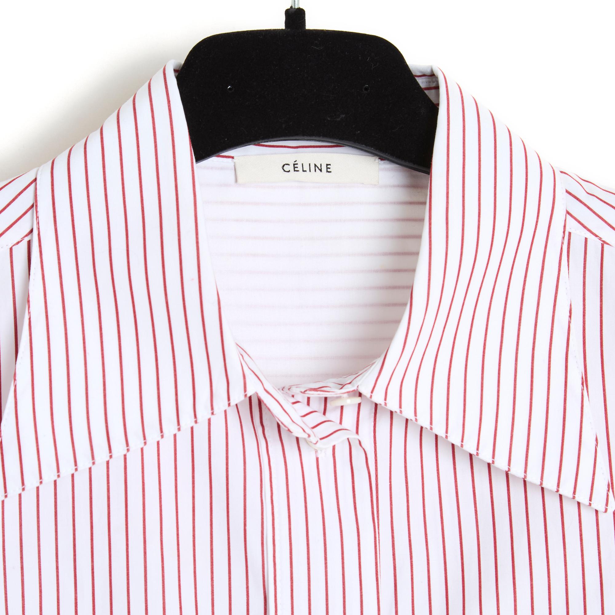 Céline top by Phoebe Philo circa 2012 in cotton poplin with fine red stripes, straight cut, shirt collar closed with 7 buttons, long sleeves closed with 2 buttons, shirt bottom. Size 38FR or UK10 and US8: middle 40 cm, chest 48 cm, length 80 cm,