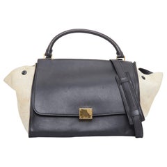 CELINE Trapeze, borsa a tracolla in pelle liscia nera e tela color crema