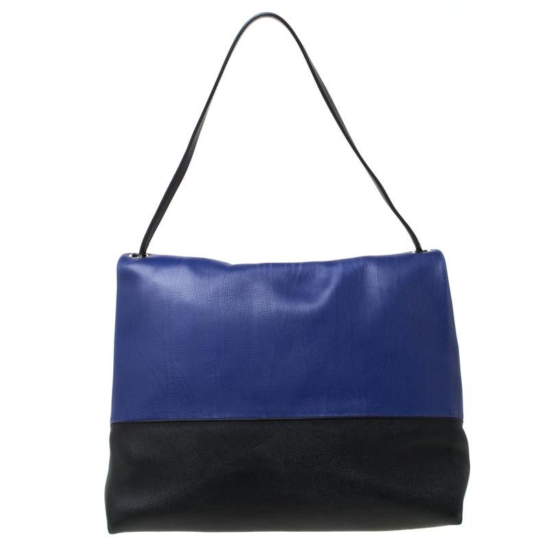 This beauty comes from the house of Celine. It has been crafted from leather in multiple shades and equipped with a shoulder strap and a capacious suede interior that will hold all your essentials and much more. Simple in design and high on appeal,