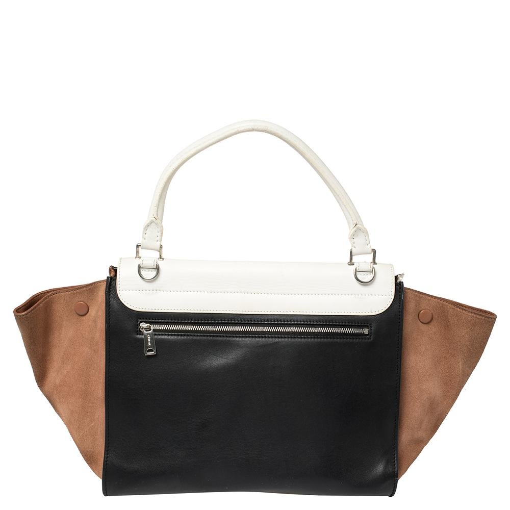 In every stride, swing, and twirl, your audience will gasp in admiration at the beautiful sight of this Celine bag. Crafted from leather and suede in Italy, the bag has a style that will catch glances from a mile. It has been designed with the