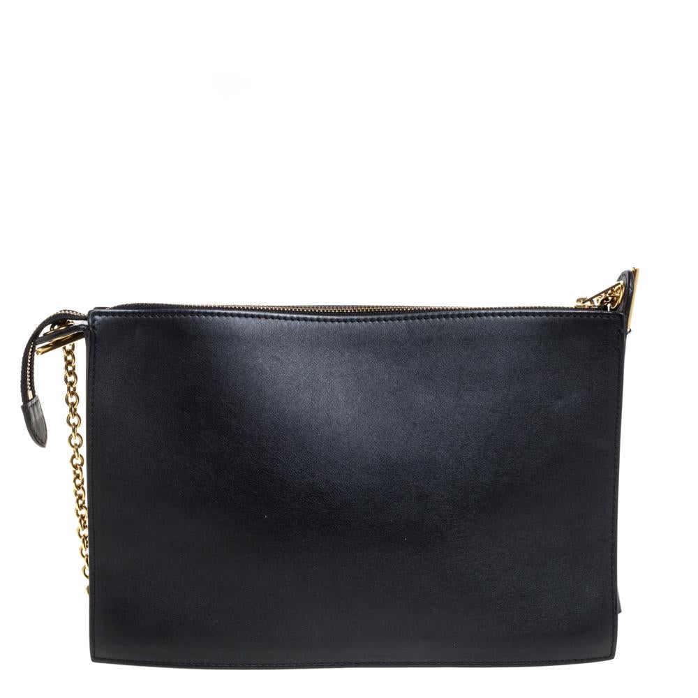This splendid bag from Celine is crafted from leather in a tricolor palette and features a front pocket. It has a top zip closure that opens to a spacious leather interior capable of holding your daily essentials. It is complete with a gold-tone