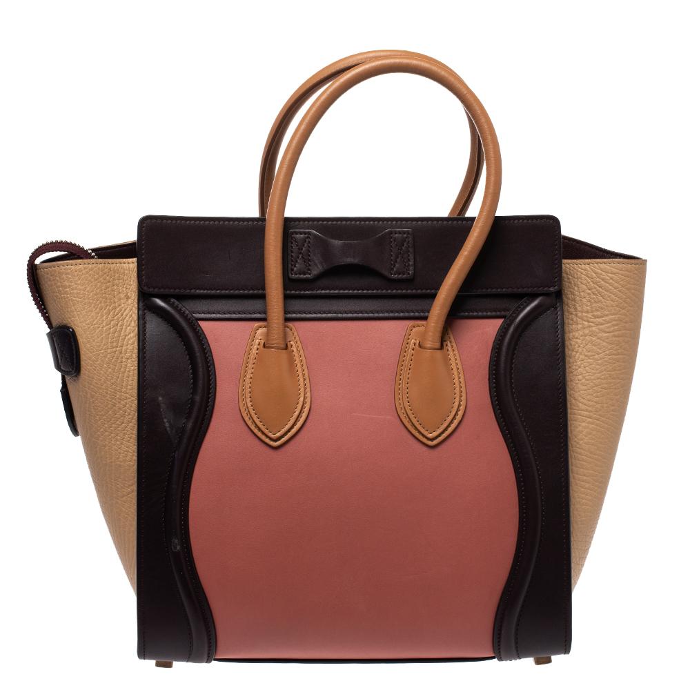The mini Luggage tote from Celine is one of the most popular handbags in the world. This tote is crafted from leather and designed in lovely shades. It comes with rolled top handles, gold-tone and a front zip pocket. The bag is equipped with a