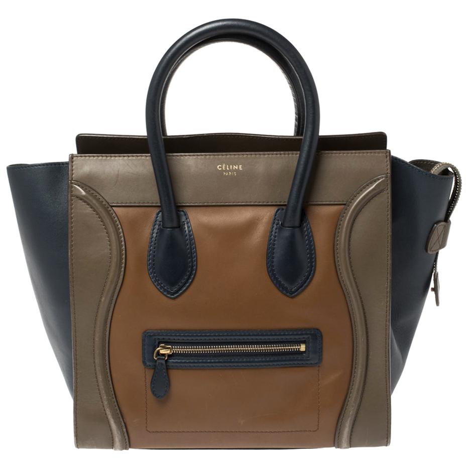 The mini Luggage tote from Celine is one of the most popular handbags in the world. This tote is crafted from leather and designed in multicolor shades. It comes with rolled top handles and a front zip pocket. The bag is equipped with a well-sized