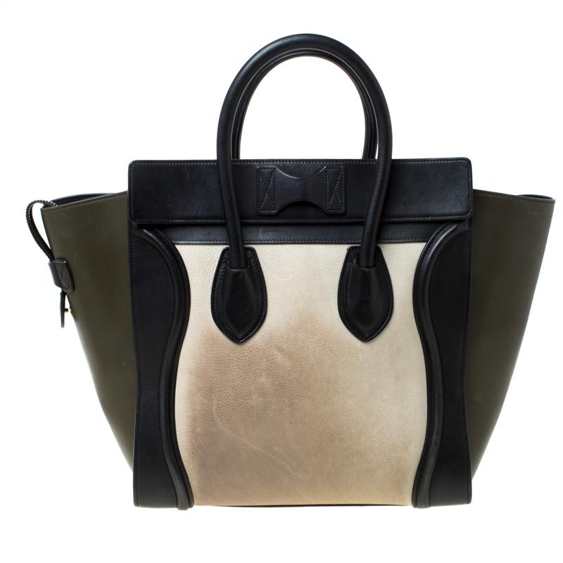 The mini Luggage tote from Celine is one of the most popular handbags in the world. This tri-color tote is crafted from leather. It comes with rolled top handles, a and a front zip pocket. The bag is equipped with a well-sized leather and nubuck