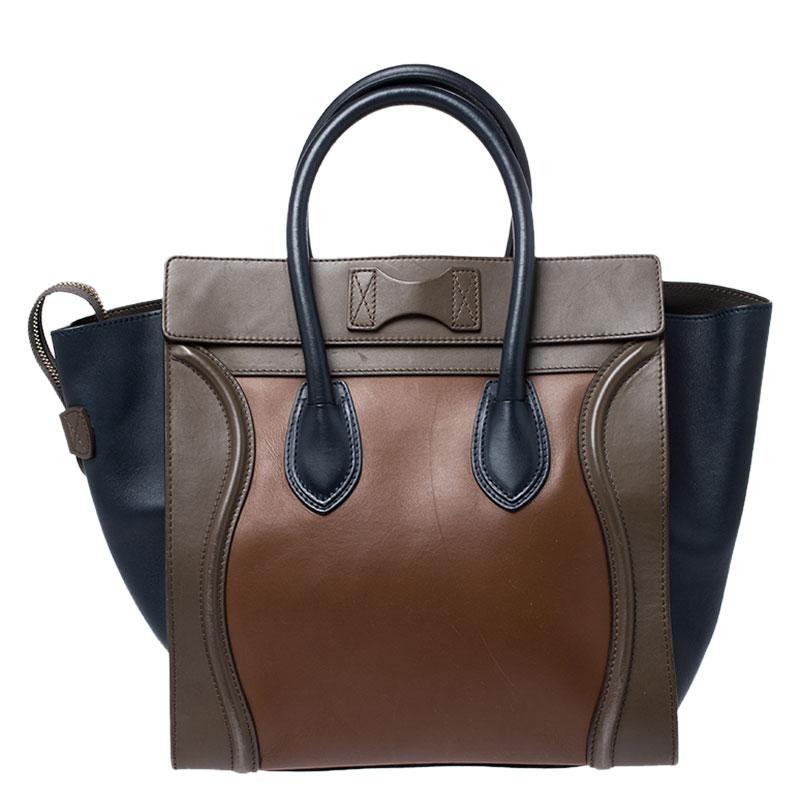 The mini Luggage tote from Celine is one of the most popular handbags in the world. This tote is crafted from leather and designed in a tri color. It comes with rolled top handles, protective metal feet and a front zip pocket. The bag is equipped
