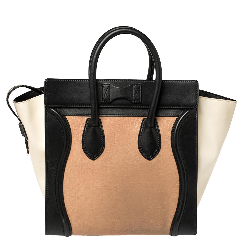 The mini Luggage tote from Celine is one of the most popular handbags in the world. This tote is crafted from leather and designed in multicolors. It comes with rolled top handles and a front zip pocket. The bag is equipped with a well-sized leather
