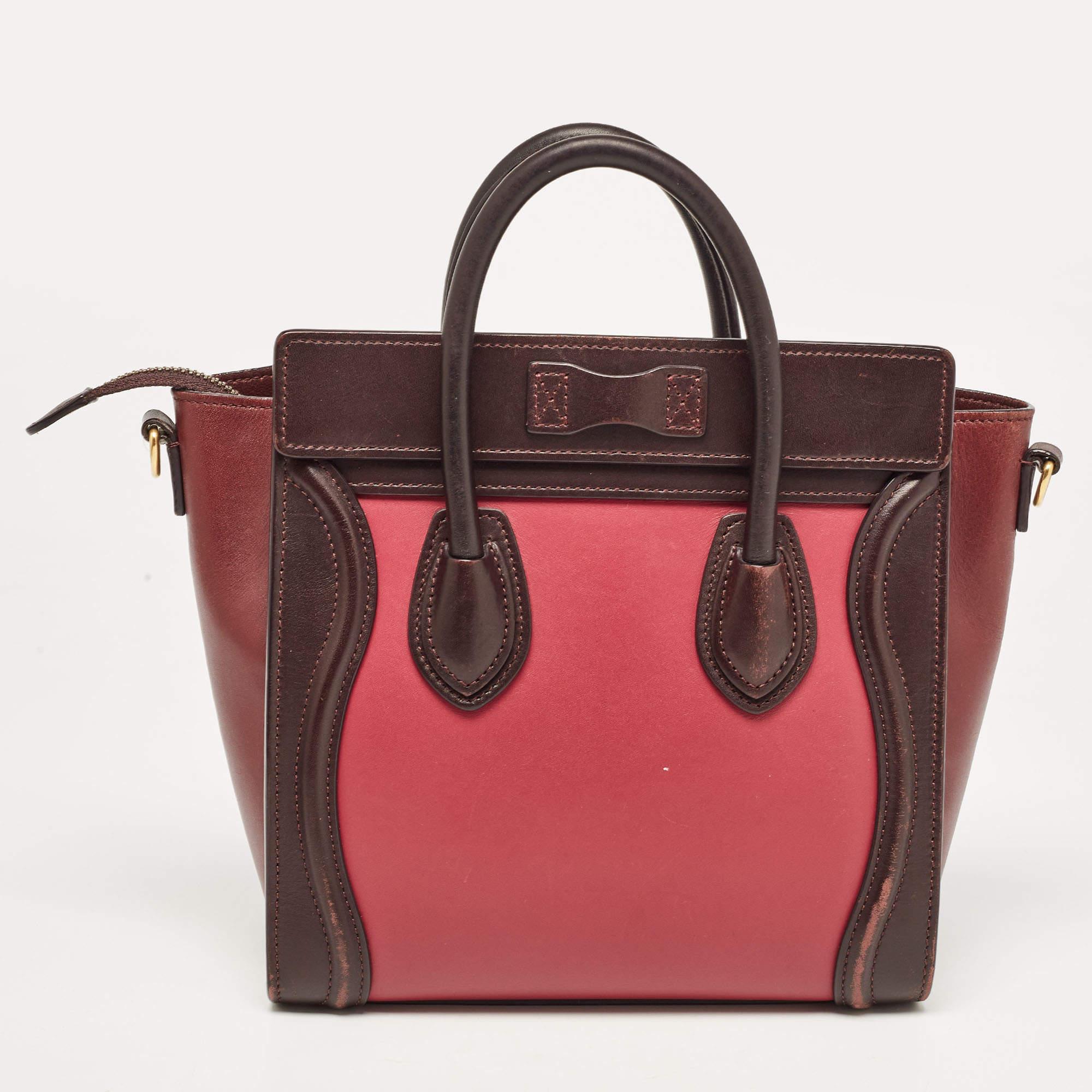 The Nano Luggage tote from Celine is one of the most popular handbags in the world. This tote is crafted from leather and designed in tricolors. It comes with rolled top handles, a detachable shoulder strap, and a front zip pocket. The bag is