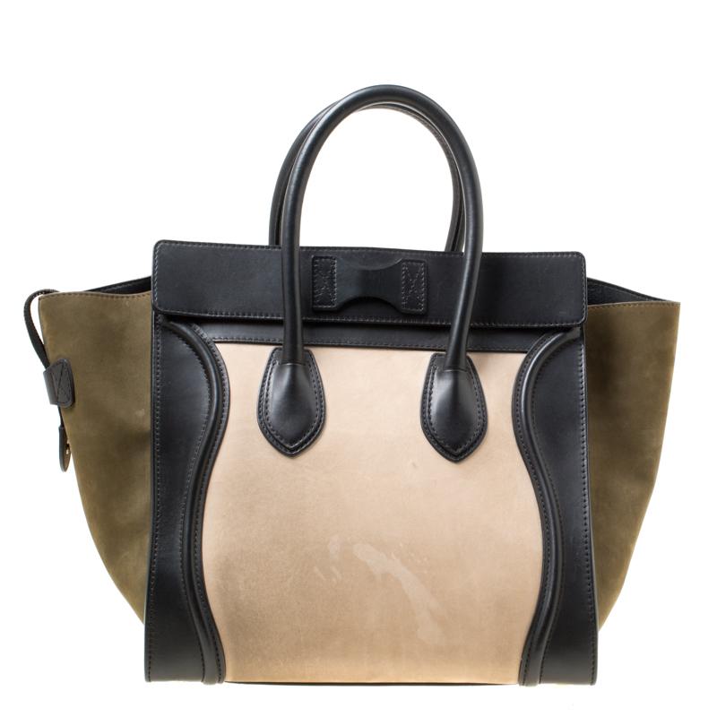 The iconic Mini Luggage tote from the house of Celine has had a cult following ever since its introduction. Featuring a chic trapeze shape, this bag is crafted in tri-colour nubuck and leather with wings, two rolled top handles and secured with a