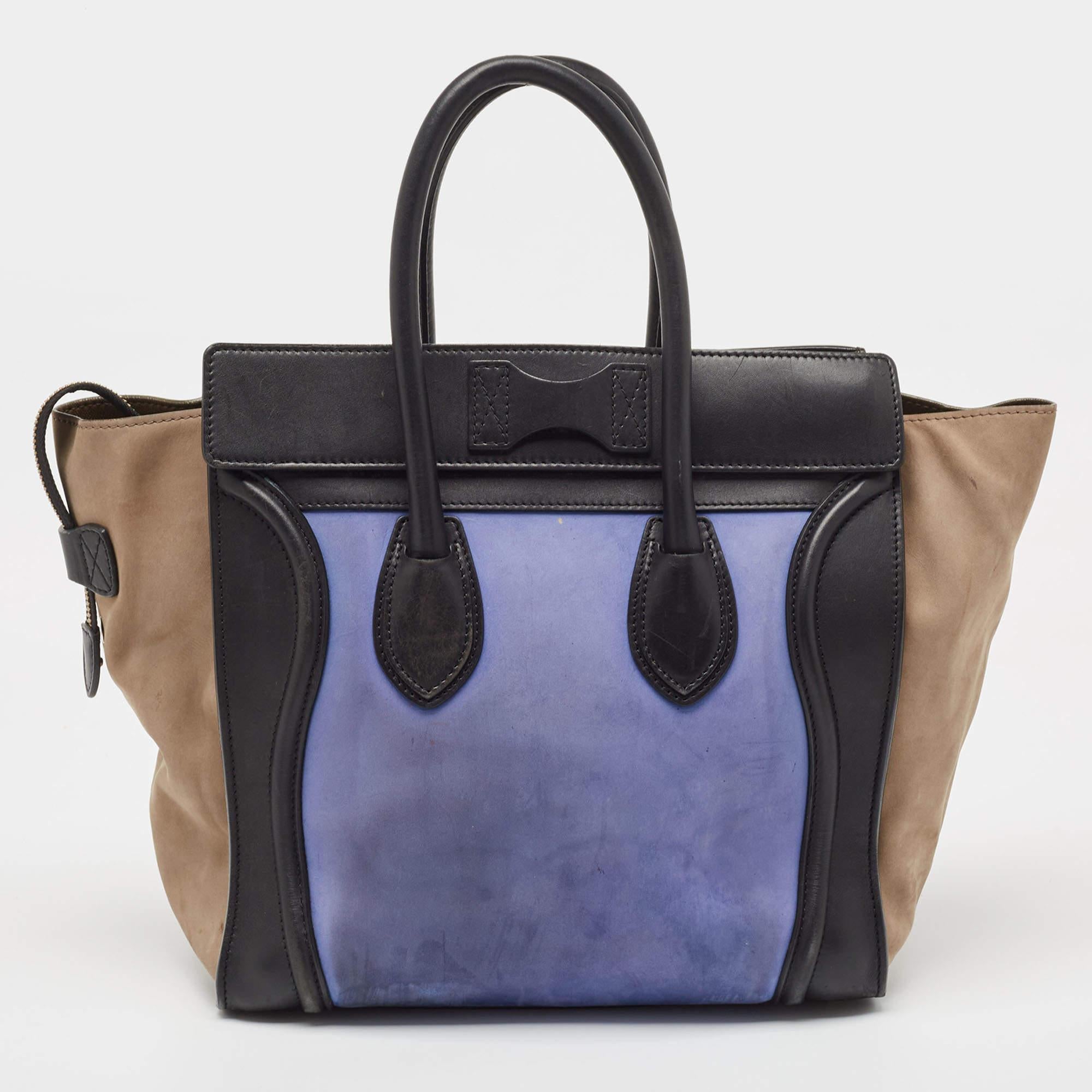 The usage of tri-color leather on the exterior gives this Celine tote a high appeal. An eye-catching accessory, the bag features a front zipper pocket, dual handles at the top, and gold-tone hardware. The leather-lined interior is equipped to store