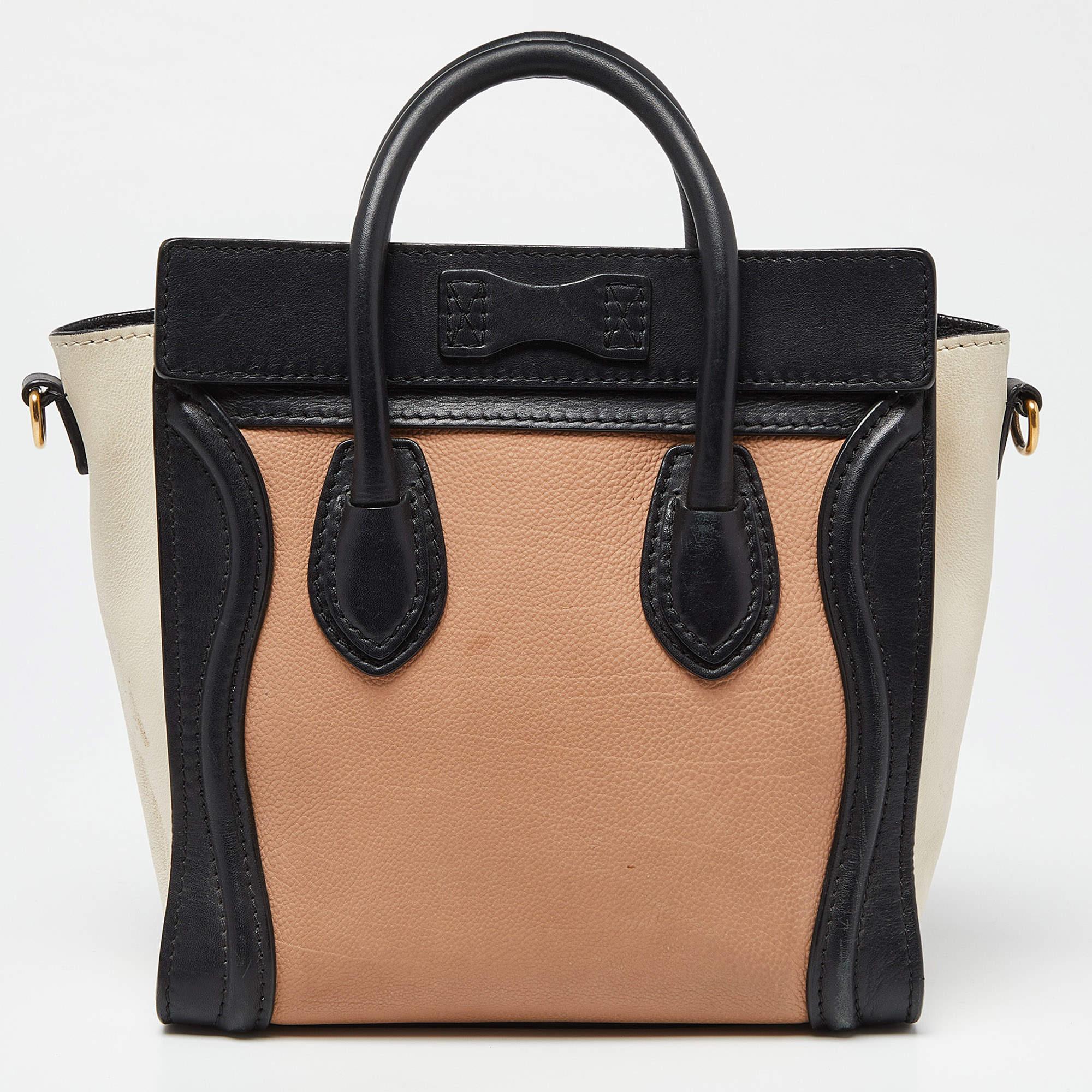 The Nano Luggage tote from Celine is one of the most popular handbags in the world. This version comes in a tricolor style. It comes with rolled top handles, a detachable shoulder strap, and a front zip pocket. The bag is equipped with a well-sized