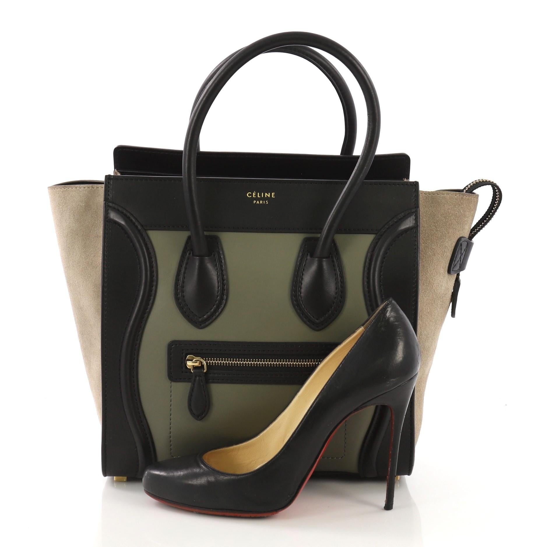 This Celine Tricolor Luggage Handbag Leather Micro, crafted in green and black leather and gray suede, features a front zip pocket, dual rolled leather handles, and gold-tone hardware. Its zip closure opens to a black leather interior with zip and