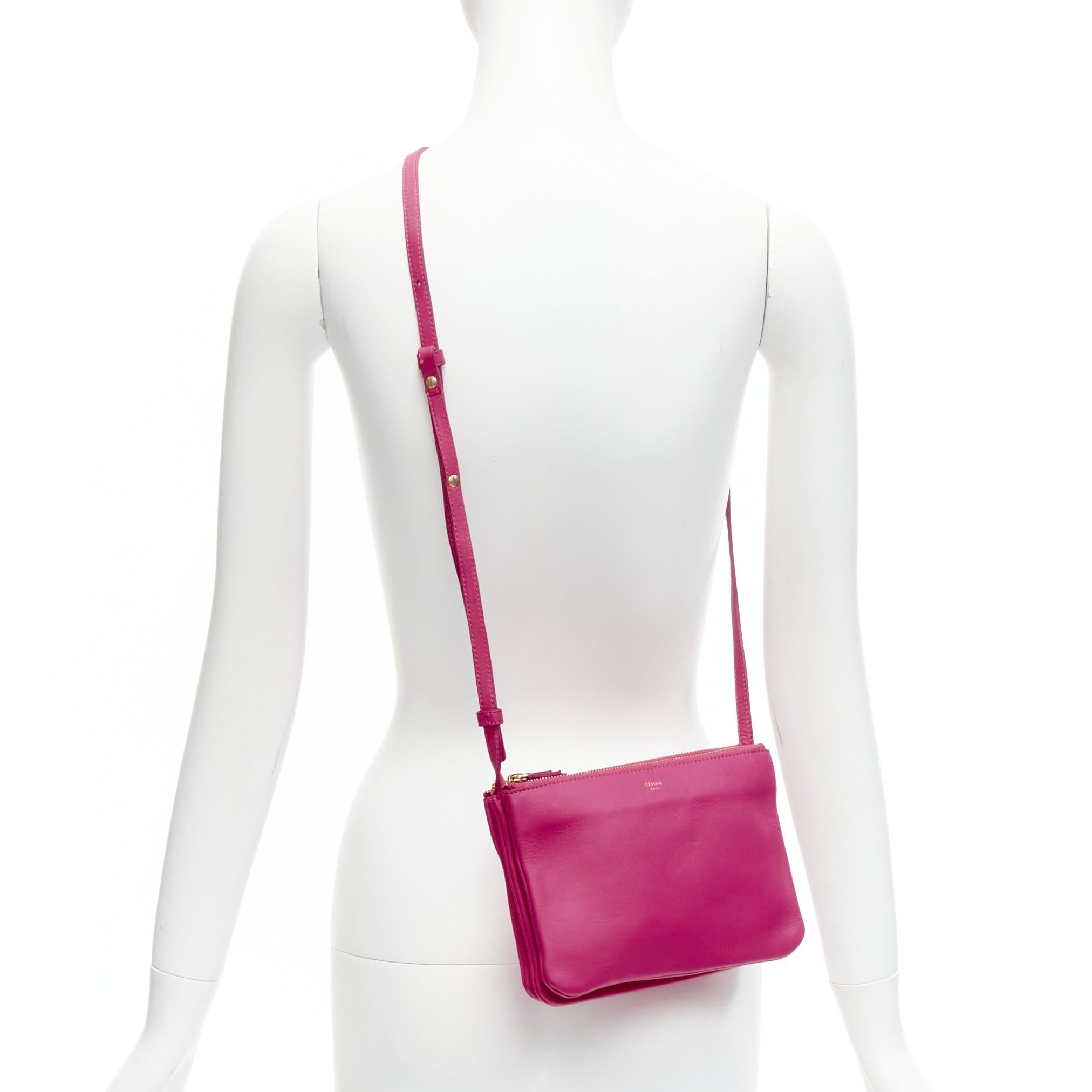 CELINE Trio pink soft leather detachable shoulder strap medium pouch crossbody bag
Reference: BSHW/A00074
Brand: Celine
Designer: Phoebe Philo
Model: Trio
Material: Leather
Color: Pink
Pattern: Solid
Closure: Zip
Lining: Grey Fabric
Extra Details: