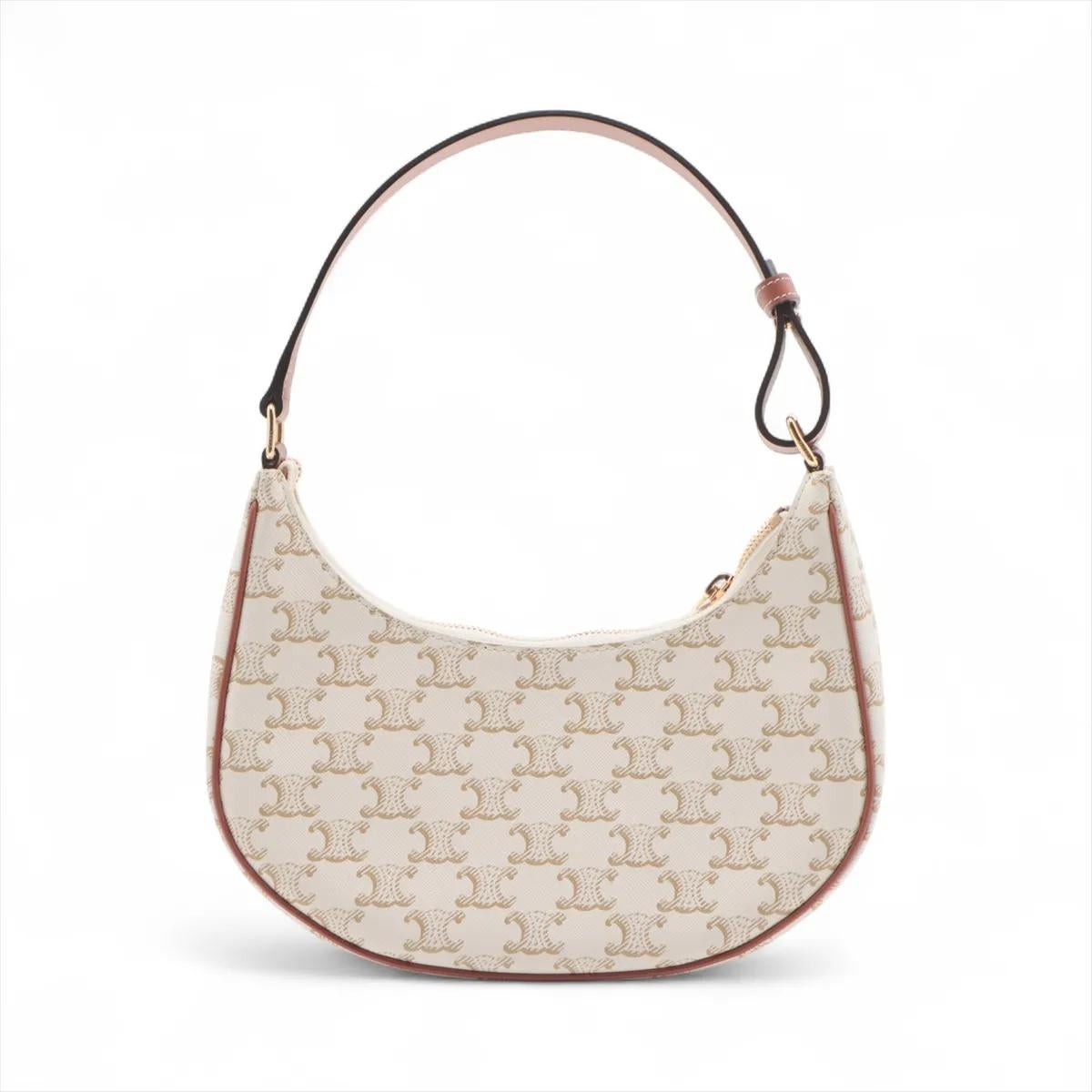 Le sac à bandoulière Ava de Celine en blanc est une pièce raffinée et moderne qui incarne parfaitement l'élégance minimaliste de la marque. Confectionné en cuir lisse, il arbore le logo iconique Triomphe, qui ajoute une touche signature à sa