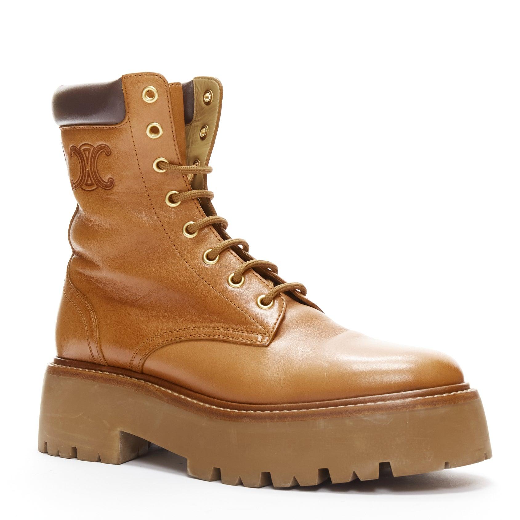 CELINE Triomphe Bulky logo tan calfskin lace up worker lug sole boots EU38
Reference: CNPG/A00041
Brand: Celine
Designer: Hedi Slimane
Collection: Triomphe Chunky - Runway
As seen on: Gwyneth Paltrow
Material: Leather
Color: Brown
Pattern: