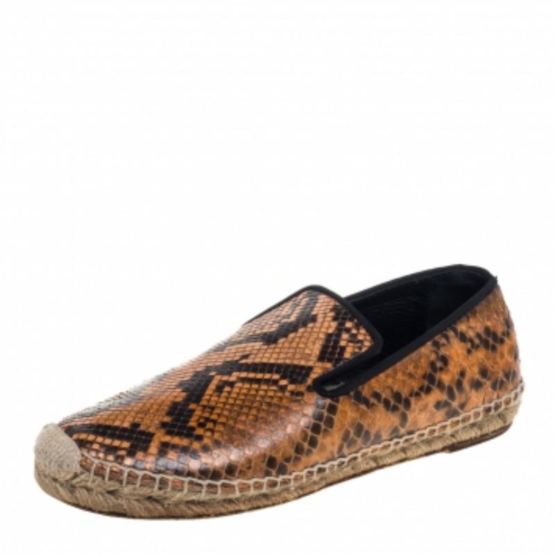 Practical, stylish, and durable—these flats by Celine are carefully built to be fine companions to your style. They come made using python leather in a slip-on style and are finished with black fabric piping and leather soles. NOTE: AVAILABLE FOR