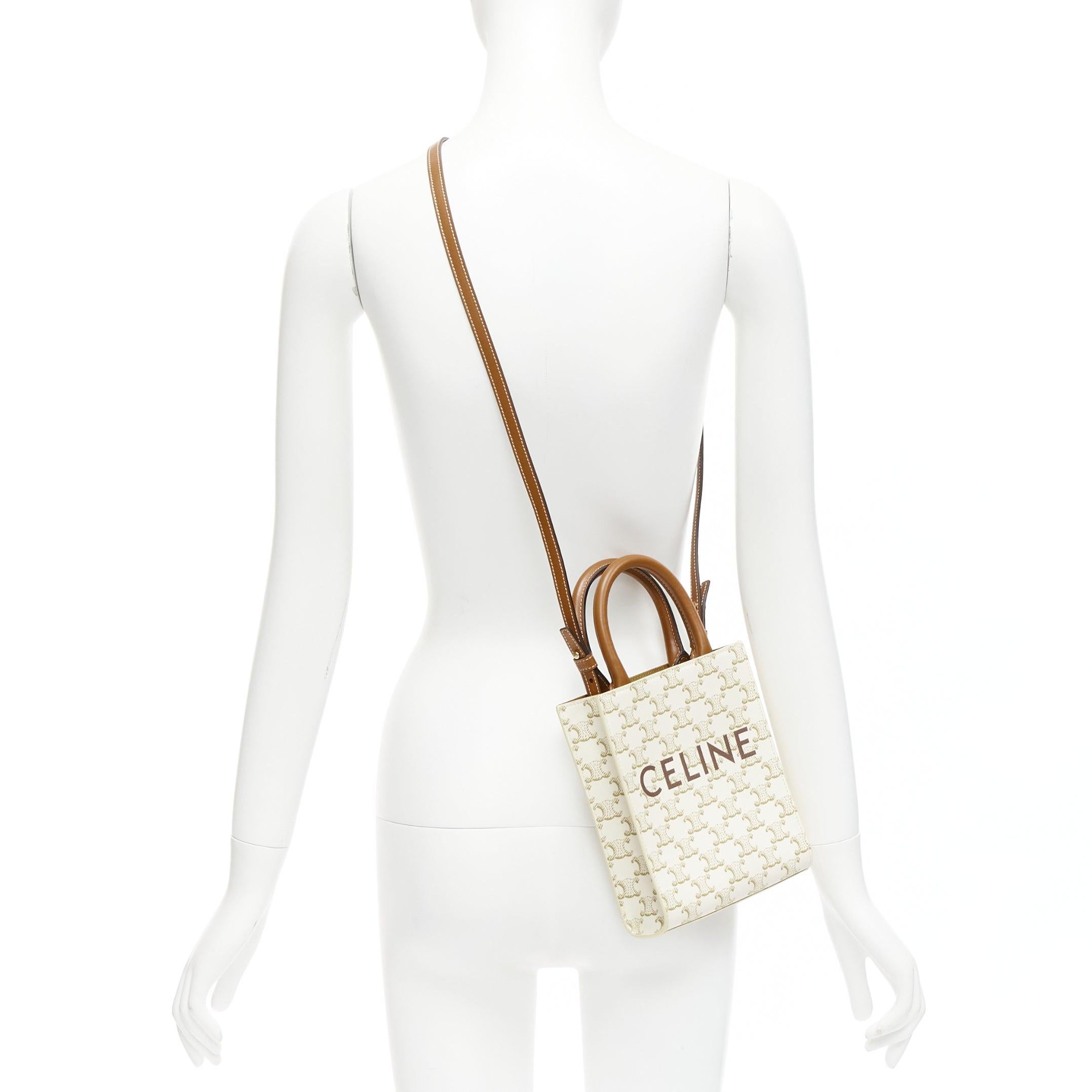 CELINE Vertical Cabas brown Tromphe logo beige monogram mini crossbody tote bag
Reference: LNKO/A02289
Brand: Celine
Designer: Hedi Slimane
Model: Vertical Cabas
Material: Canvas, Leather
Color: Brown, Beige
Pattern: Monogram
Lining: Brown