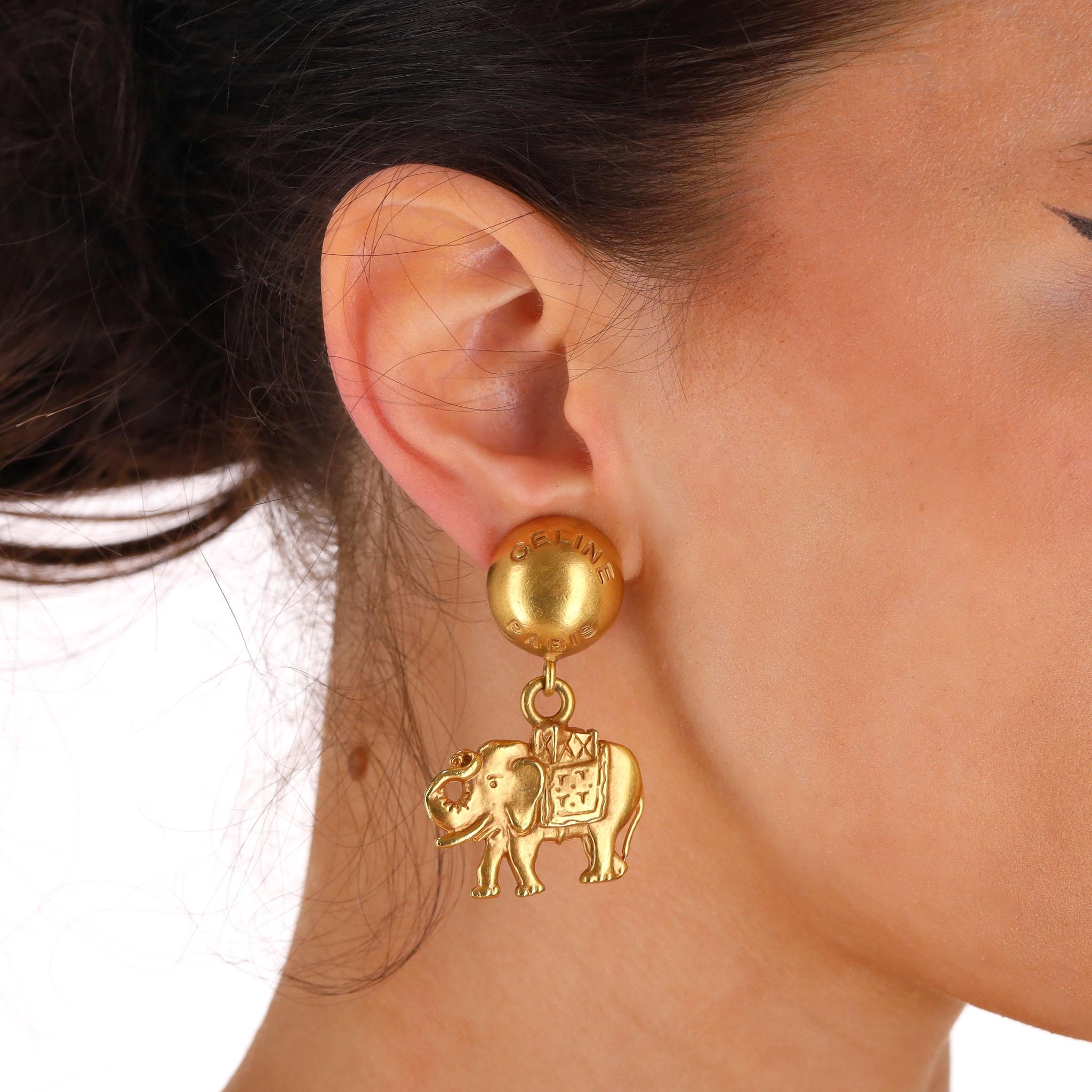 Collectors Item - Celine Vintage 80's Elephant Dangle Clip-On Earrings

Created by Celine Vipiana and a true collectors dream!

Gold bronze earrings with elephant pendant motif which is a nod to Celine's original red elephant logo from the
