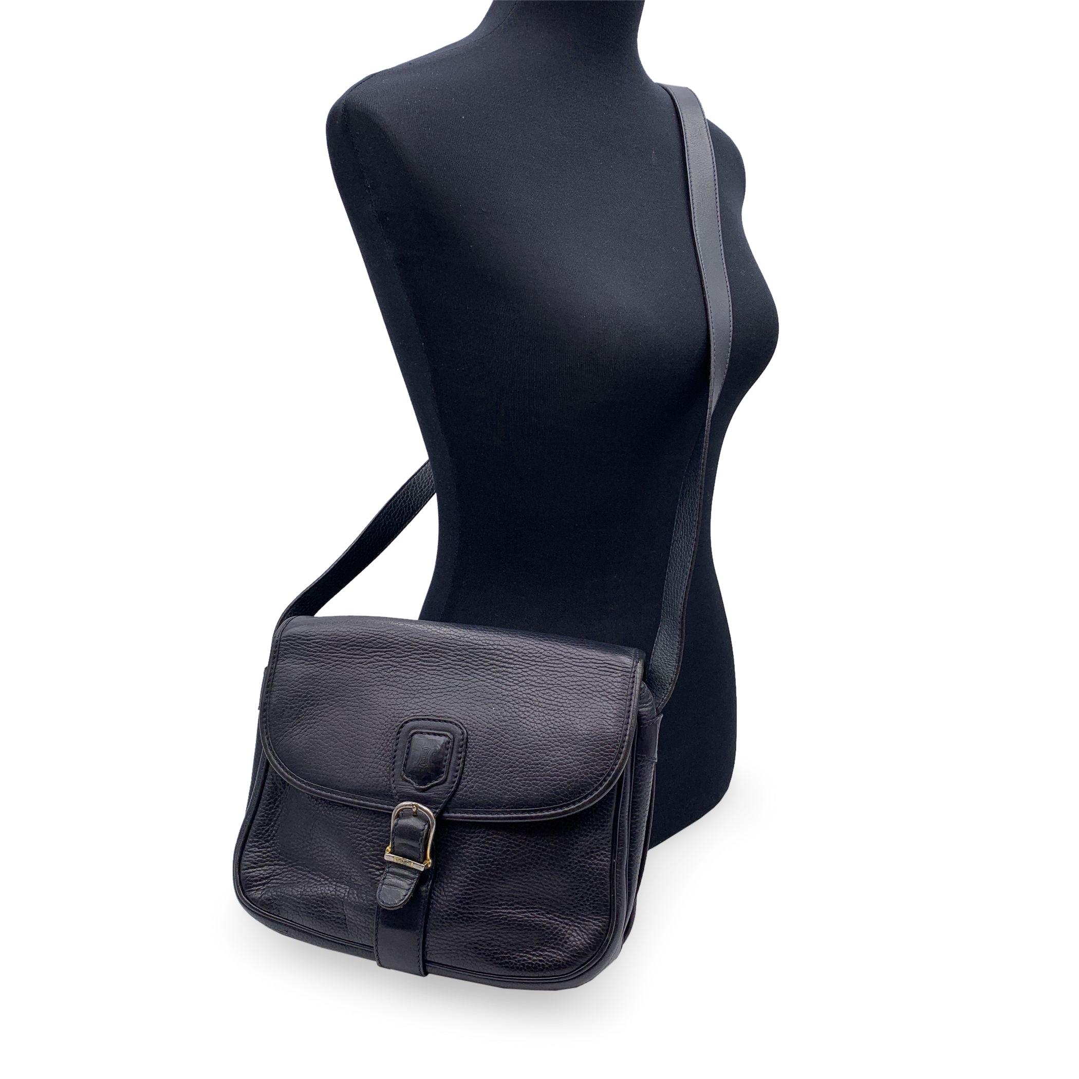 Beautiful Vintage Celine blue leather shoulder bag. Flap with magnetic button closure. Leather interior. 1 side zip pocket and 1 side open pocket under the flap. 1 rear open pocket. Adjustable shoulder strap. 'Celine Paris ' embossed inside.