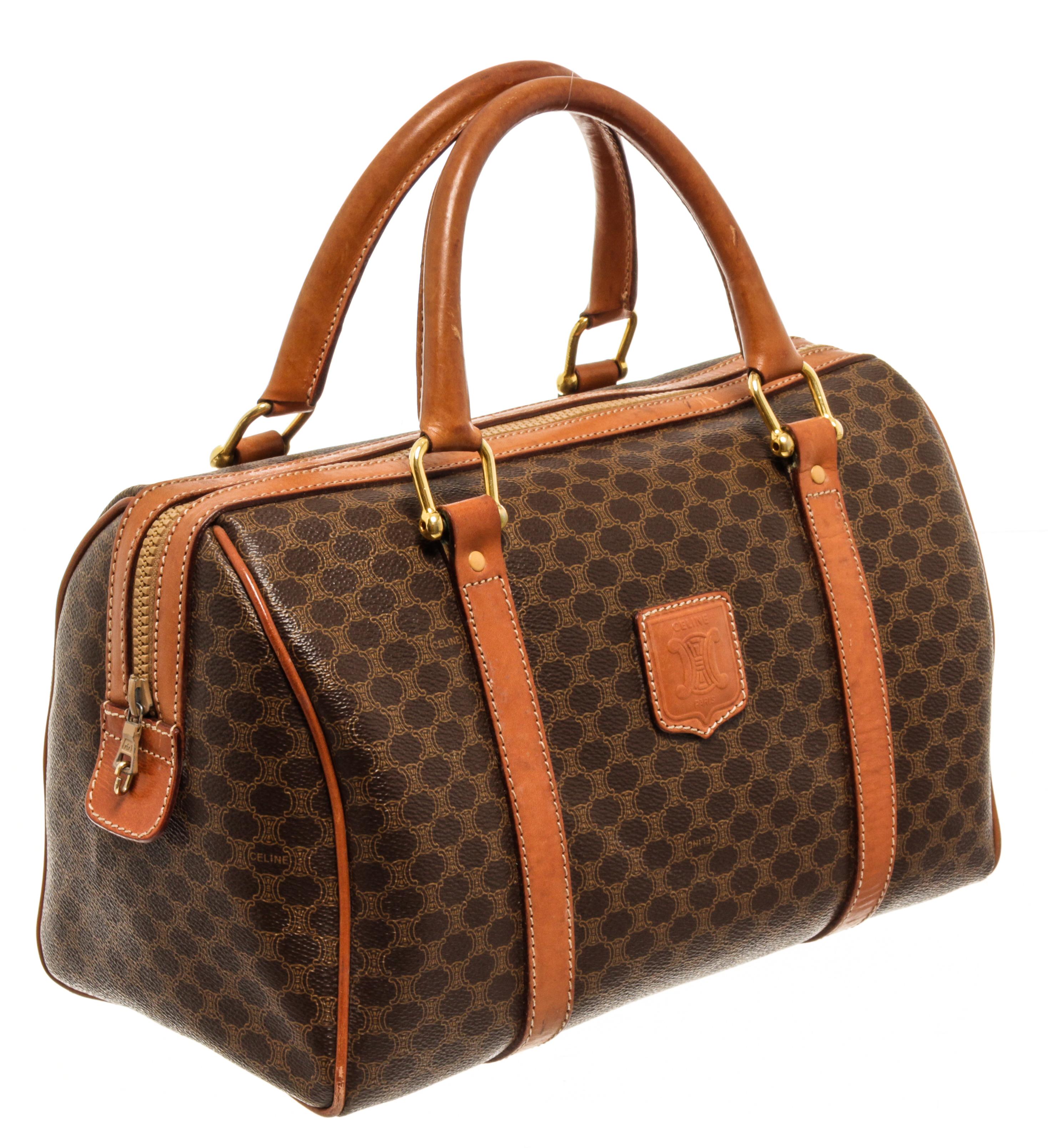 Celine vintage Boston Bag Macadam with Macadam coated canvas exterior, gold-tone hardware, brown leather lining, zip closure, and top handles.

83016MSC