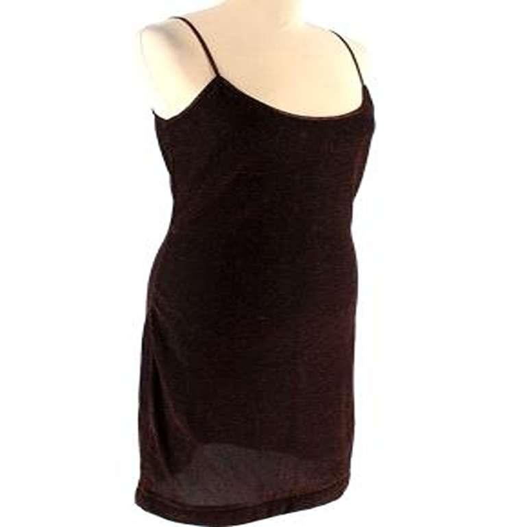 Celine Bronze Lurex Mini Dress

- Bronze metallic lurex knit mini slip dress
- Stretch double layer fabric 
- Scoop neck with thin shoulder straps 
- Soft brown lining 
- Dark brown fine knit with copper/bronze metallic shimmer 
- Black zip down the