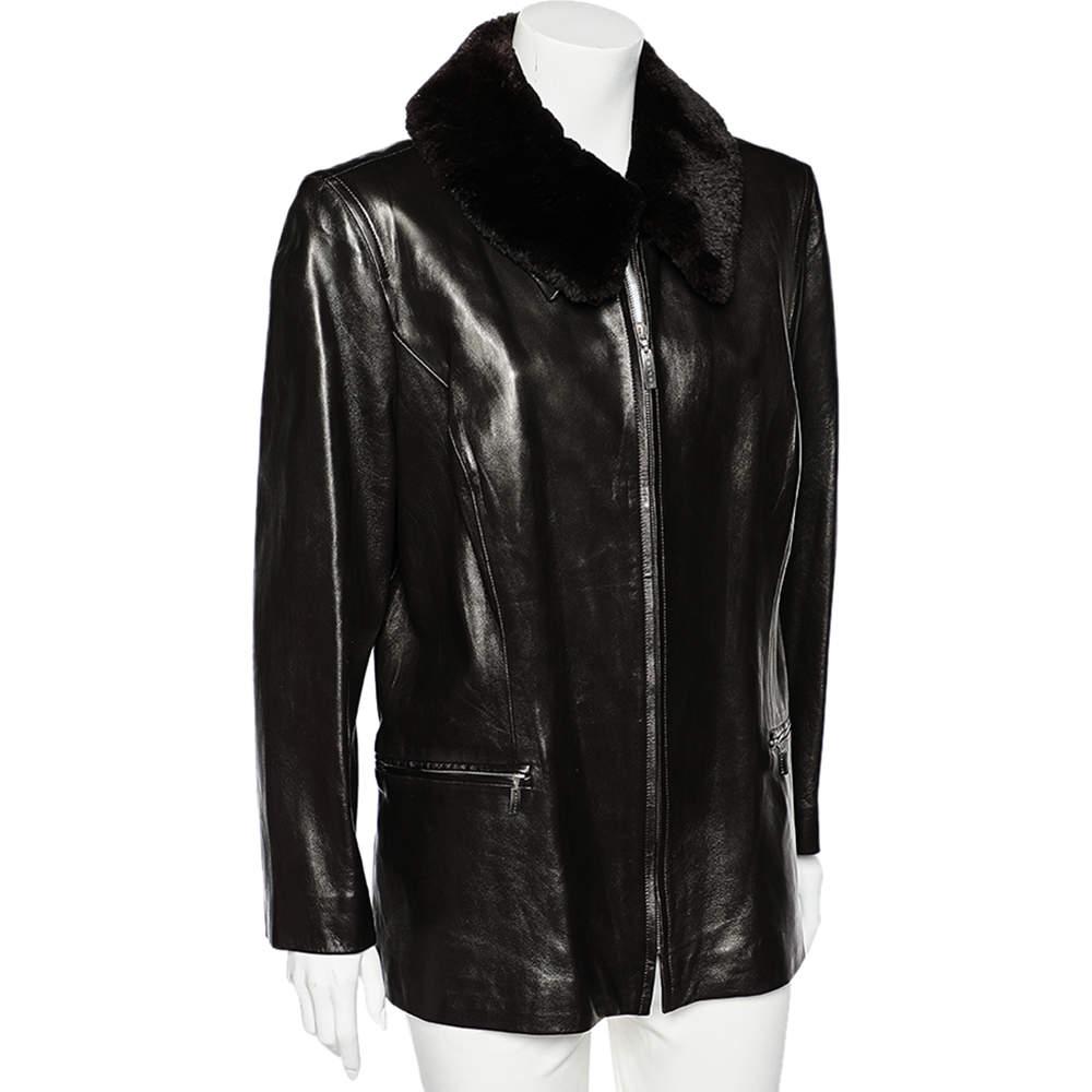 Endow your designer repertoire with marvelous, intricately tailored pieces like this jacket and make nothing but an effortless style statement! This vintage jacket from Celine is created using brown leather and embellished with a shearling collar