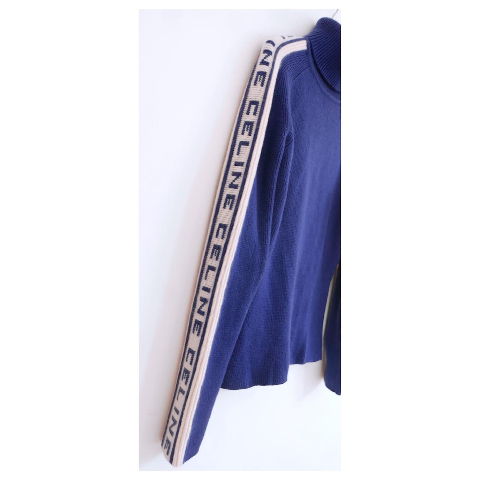 Super rare, ultra cool vintage Celine logo sleeve sweater - from the Fall 1999 Catwalk. worn once. I have never seen one of these come up for sale in this colour before. Made from very soft, thick blue cashmere with textured CELINE logo intarsia