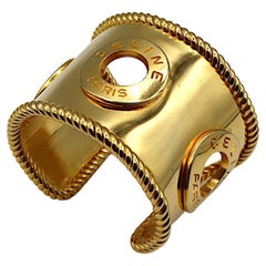 CELINE Pulsera vintage con logotipo en tono dorado