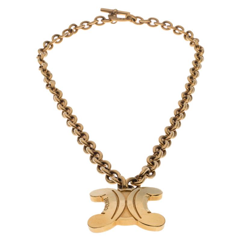 To adorn you with style, Celine brings you this simple Blazon necklace that has been made from gold-tone metal. It is a piece that will naturally evoke your love as it is well made and it comes with a pendant of the brand logo enhanced with