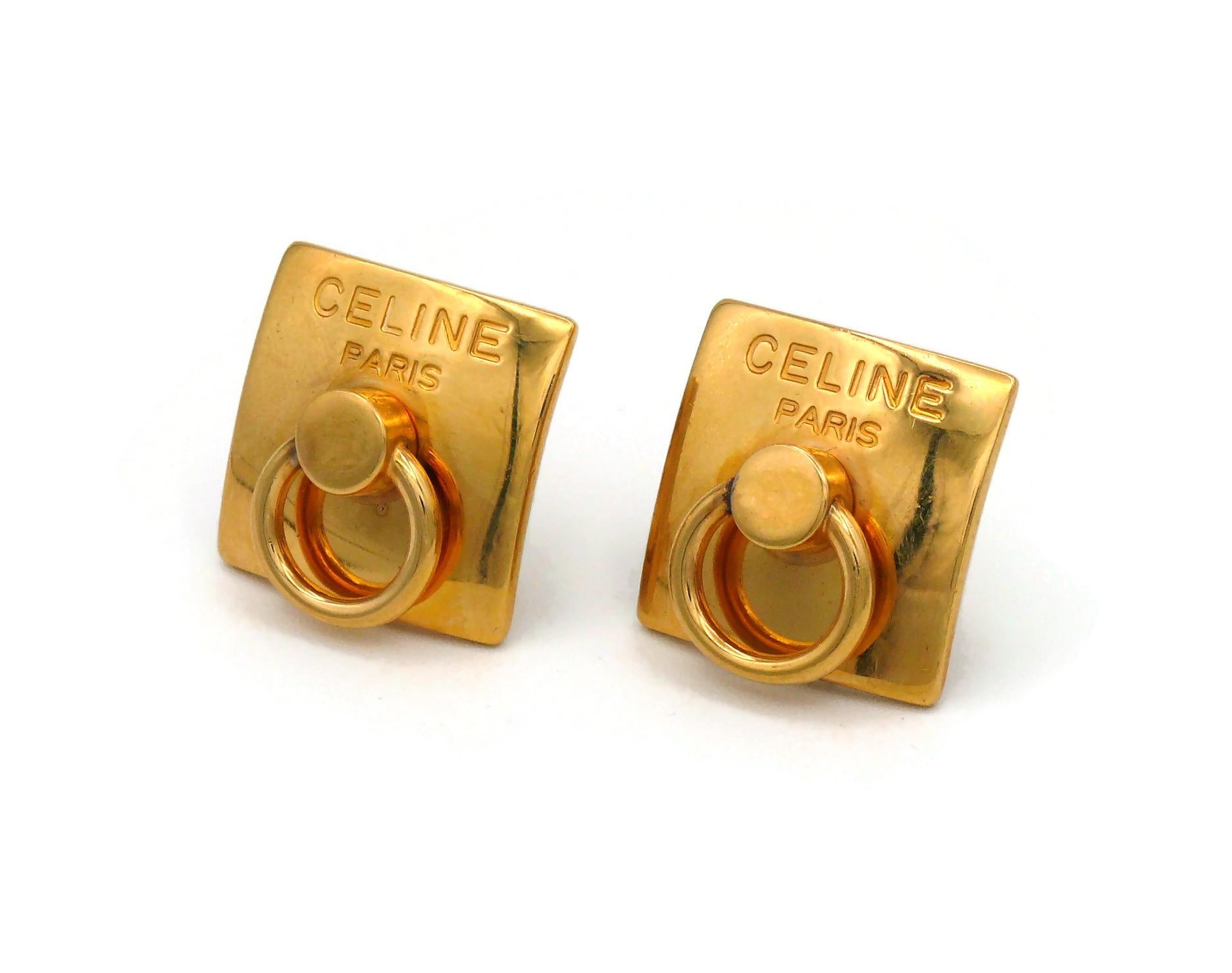 CELINE vintage gold toned door knocker clip-on earrings embossed CELINE PARIS.

Marked CELINE LF Made in Italy.

Indicative measurements : approx. 2.5 cm x 2.5 cm (0.98 inch x 0.98 inch).

Weight per earrings : approx. 14 grams.

NOTES
- This is a