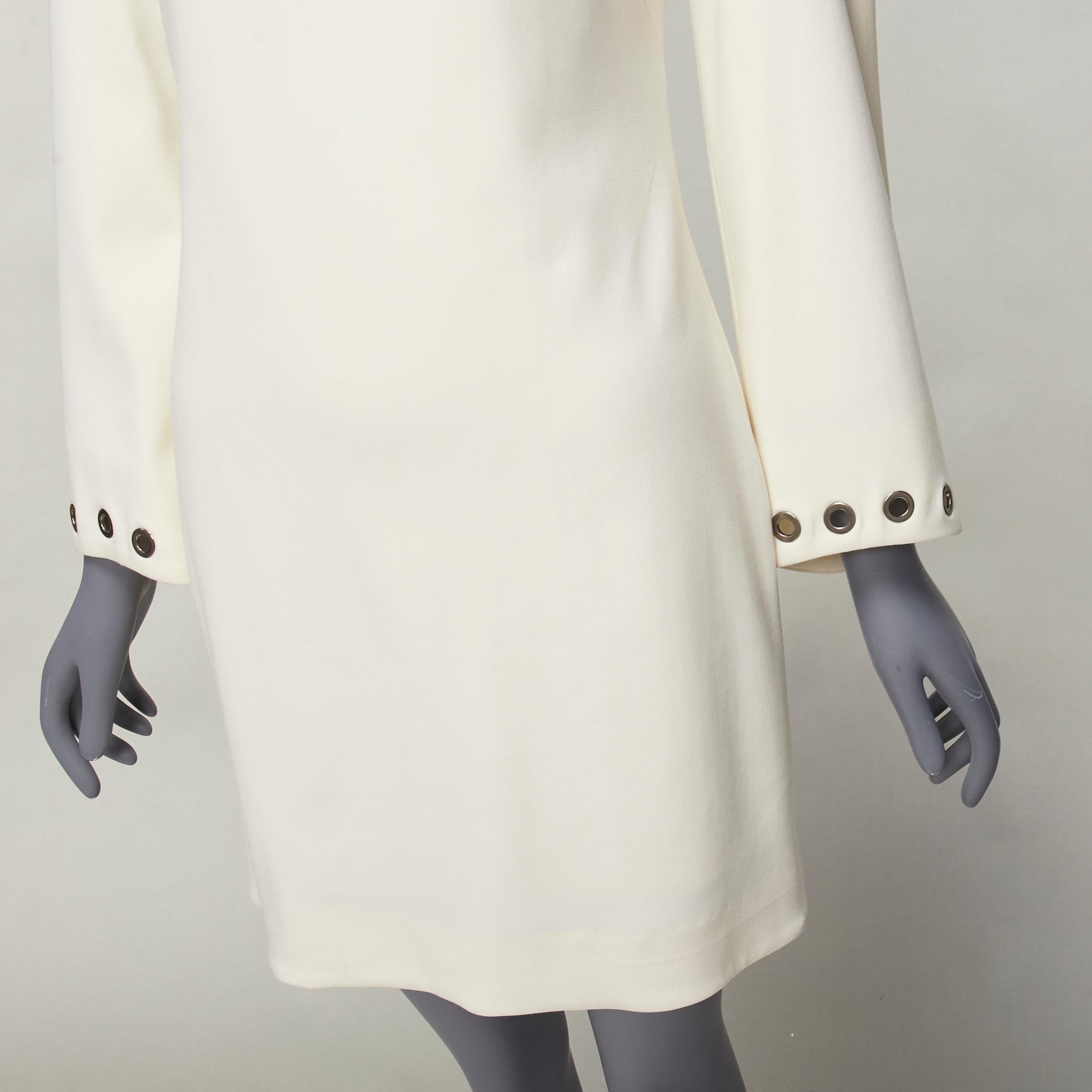 CELINE Vintage grommet detail cream crepe bell sleeve mini shift dress
Reference: CC/A00404
Brand: Celine
As seen on: Barbara Meier
Material: Feels like wool
Color: Cream, Silver
Pattern: Solid
Closure: Zip
Lining: Cream Fabric
Extra Details: Back