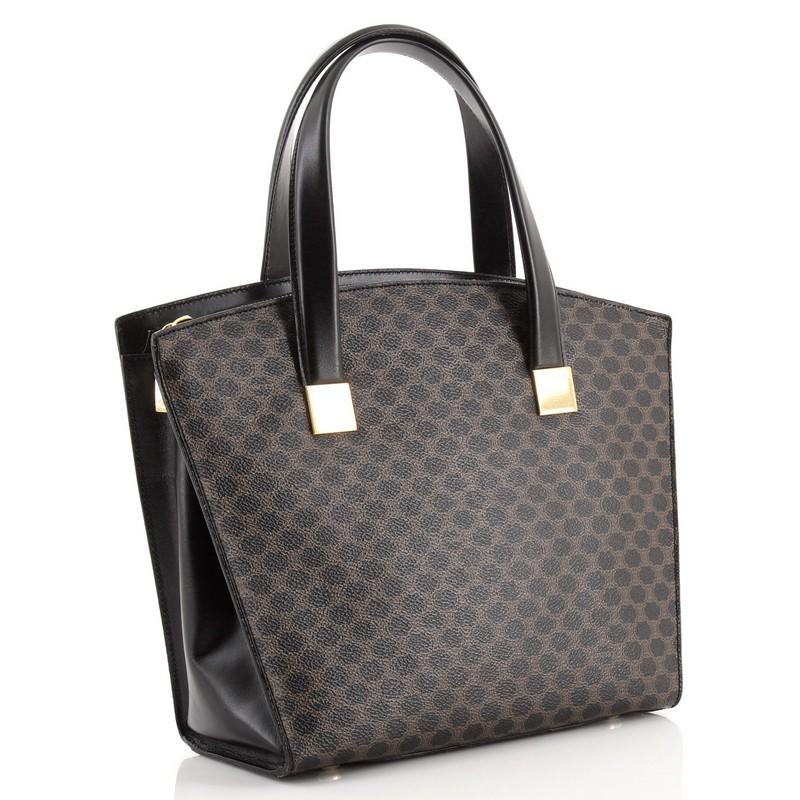 These are professional pictures of the actual item offered by Rebag.

Condition: Fair. Moderate wear on exterior corners and in interior, splitting on exterior corner wax edges. Wear and creasing on handles and strap, scuffs underneath handles and