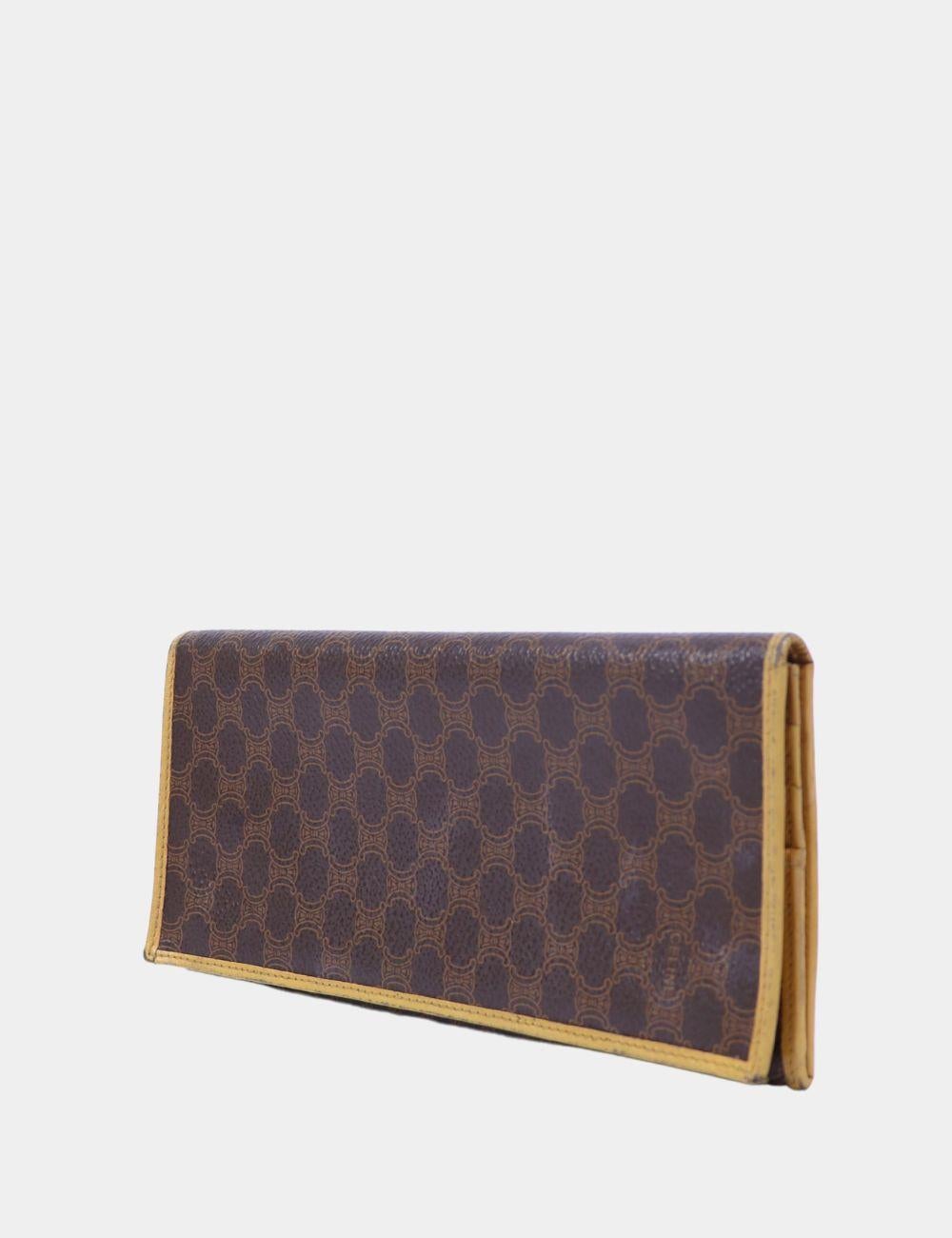 Classic and collectible, this Celine Vintage Macadam Canvas Wallet is a timeless luxury accessory. Featuring the brand’s signature Macadam monogram canvas in rich brown tones with tan leather trim, this long wallet offers understated elegance with