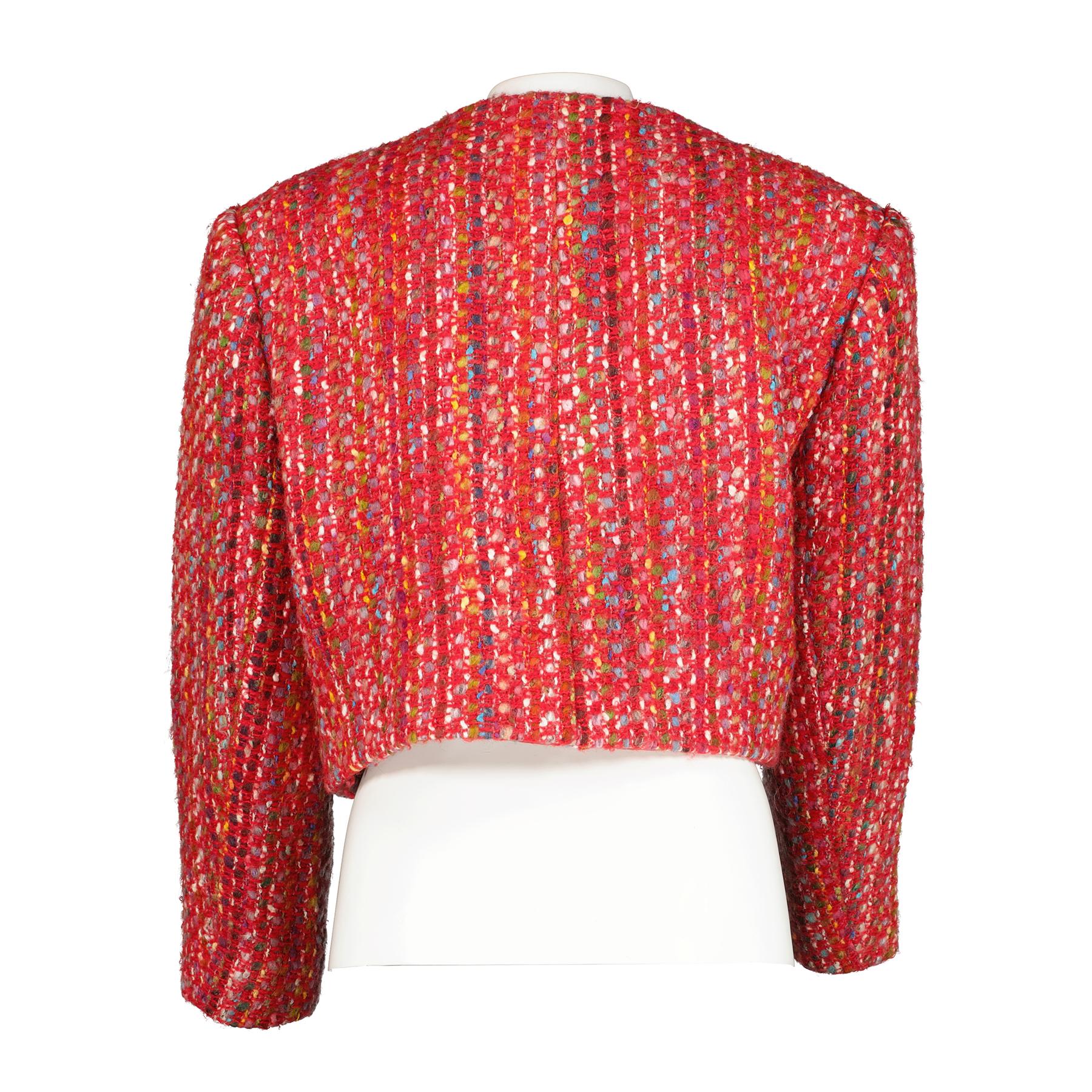 Celine Vintage Red Cropped Tweed Jacket - Size FR46

This exquisite Celine vintage jacket has been made from colourful tweed fabric with golden Triomphe chain buttons.

Composition:

75% wool
12% acrylic
13% cotton
