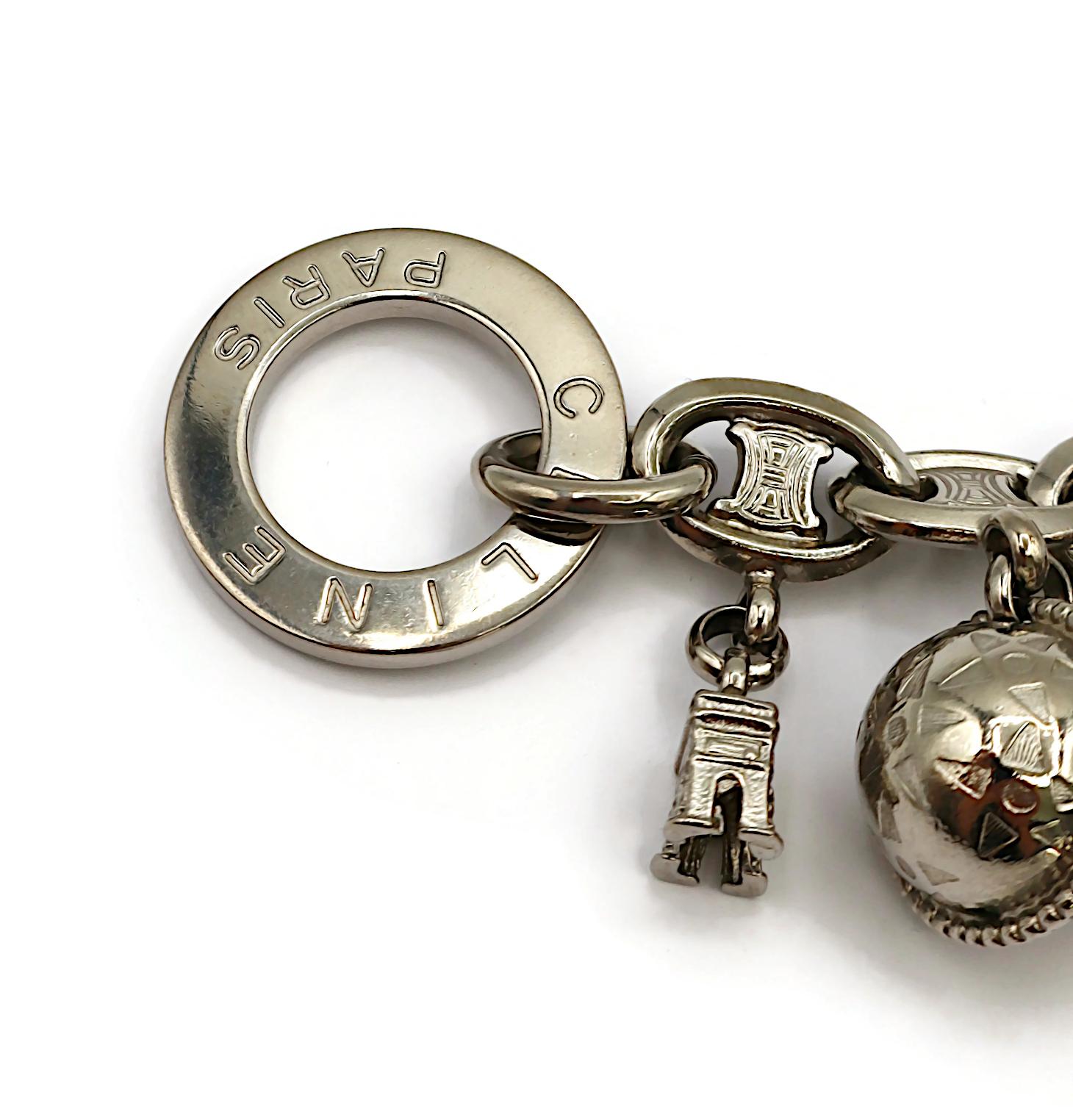 Women's CELINE Vintage Silver Tone Arc De Triomphe & Globe Charm Bracelet For Sale