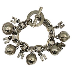 CELINE Bracciale vintage con arco di trionfo e globo in tonalità argento