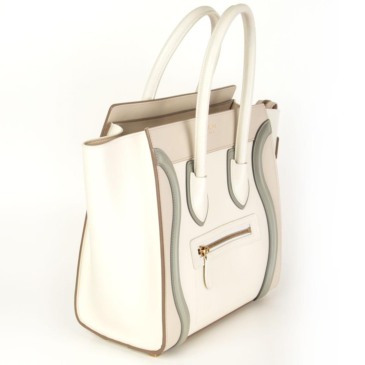 Céline 'Micro Luggage' in off-white, begie and sage grey calfskin. Opens with a zipper on top and is lined in beige calfskin with one zippe pocket against the back and two open pockets against the front. Has been carried with some pen marks on the