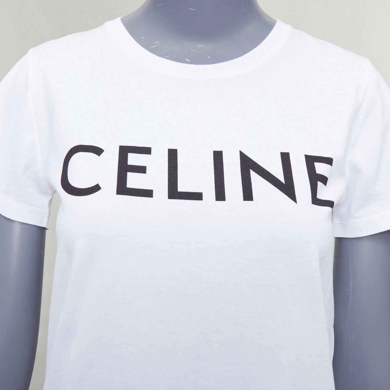 CELINE cotone bianco nero grande logo girocollo tshirt aderente XS
Riferimento: LNKO/A02543
Marchio: Celine
Stilista: Hedi Slimane
Materiale: Cotone
Colore: Bianco, Nero
Modello: Tinta unita
Chiusura: Pullover
Prodotto in: