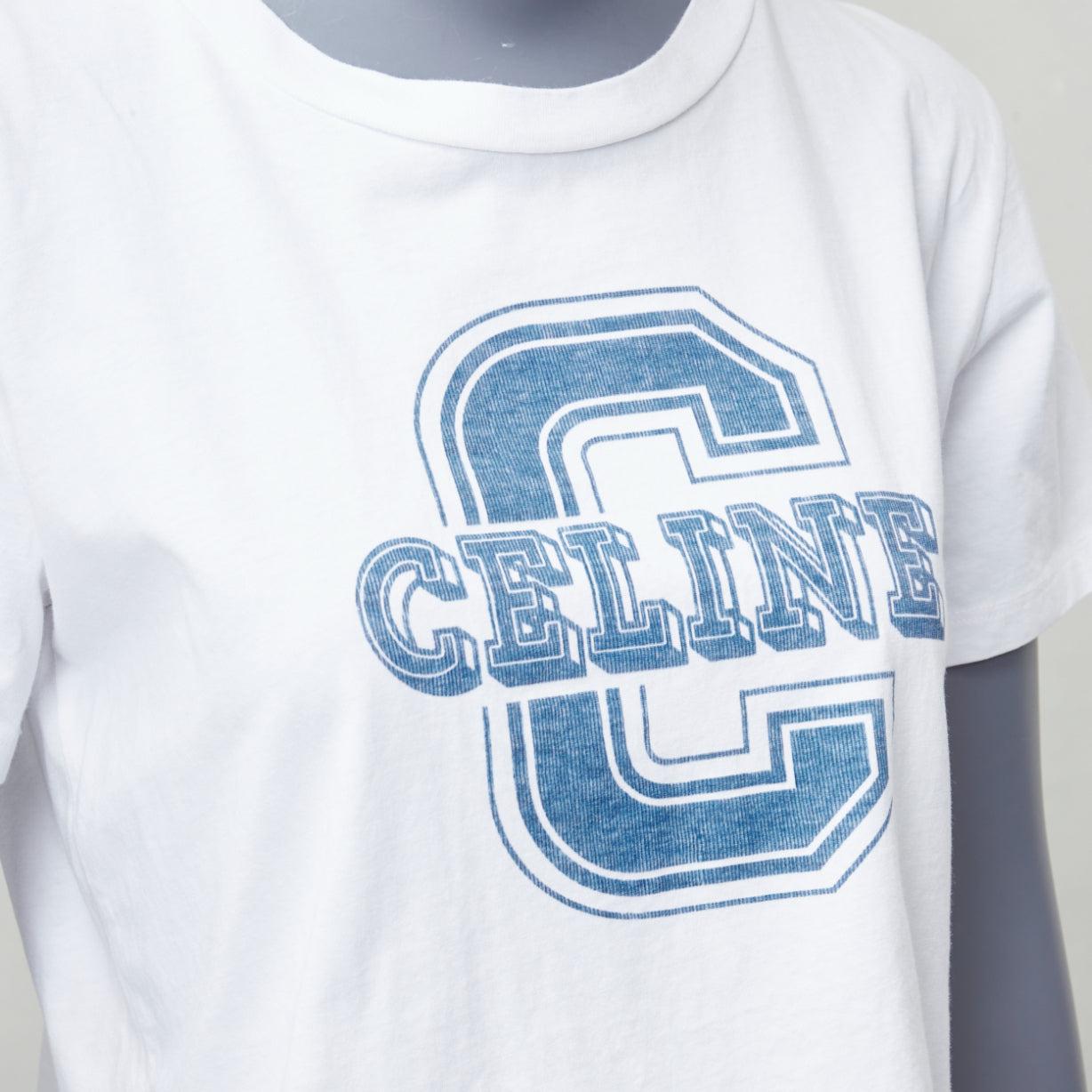 CELINE white cotton blue big C logo varsity cropped tshirt S
Reference: YIKK/A00171
Brand: Celine
Designer: Hedi Slimane
Material: Cotton
Color: White, Blue
Pattern: Solid
Closure: Slip On
Made in: Italy

CONDITION:
Condition: Excellent, this item