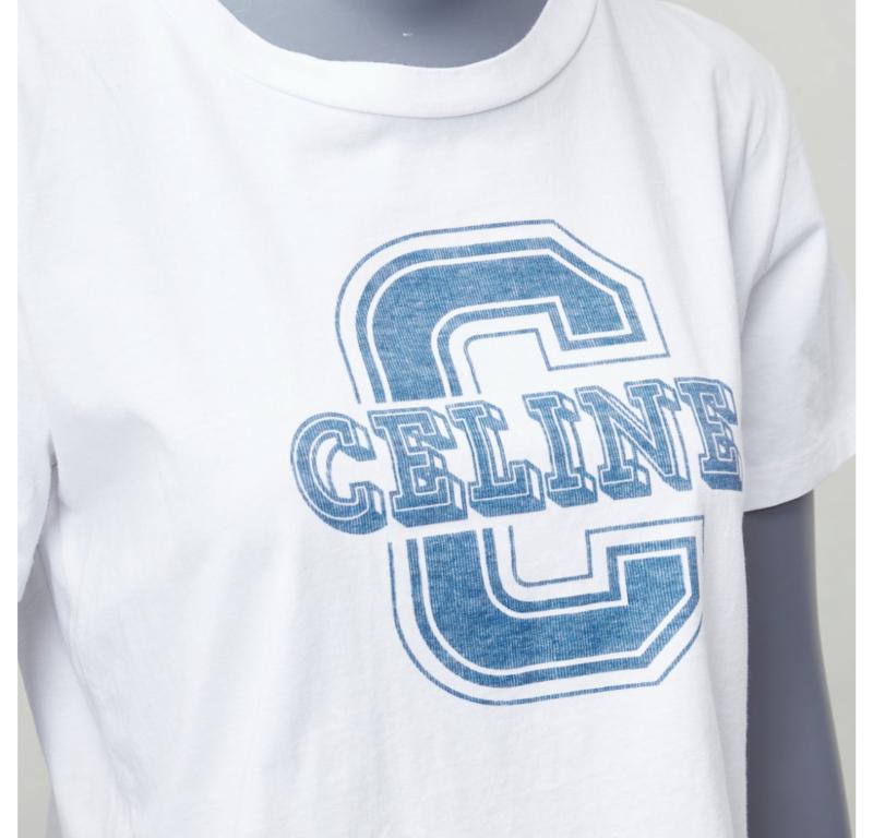 CELINE white cotton blue big C logo varsity cropped tshirt S
Reference: YIKK/A00171
Brand: Celine
Designer: Hedi Slimane
Material: Cotton
Color: White, Blue
Pattern: Solid
Closure: Slip On
Made in: Italy

CONDITION:
Condition: Excellent, this item