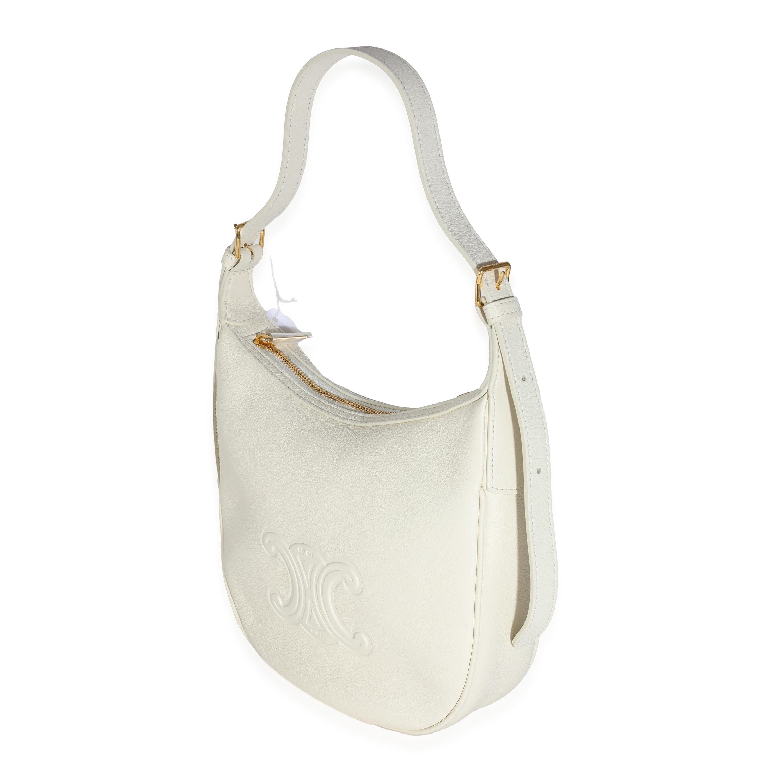 Listing Title: Celine White Cotton Supple Calfskin Cuir Triomphe Small Heloise Bag
SKU: 144118
MSRP: 2950.00 USD
Condition: Pre-owned 
Handbag Condition: Pristine
Condition Comments: Item has no indication of wear.  Final sale.
Brand: Celine
Model: