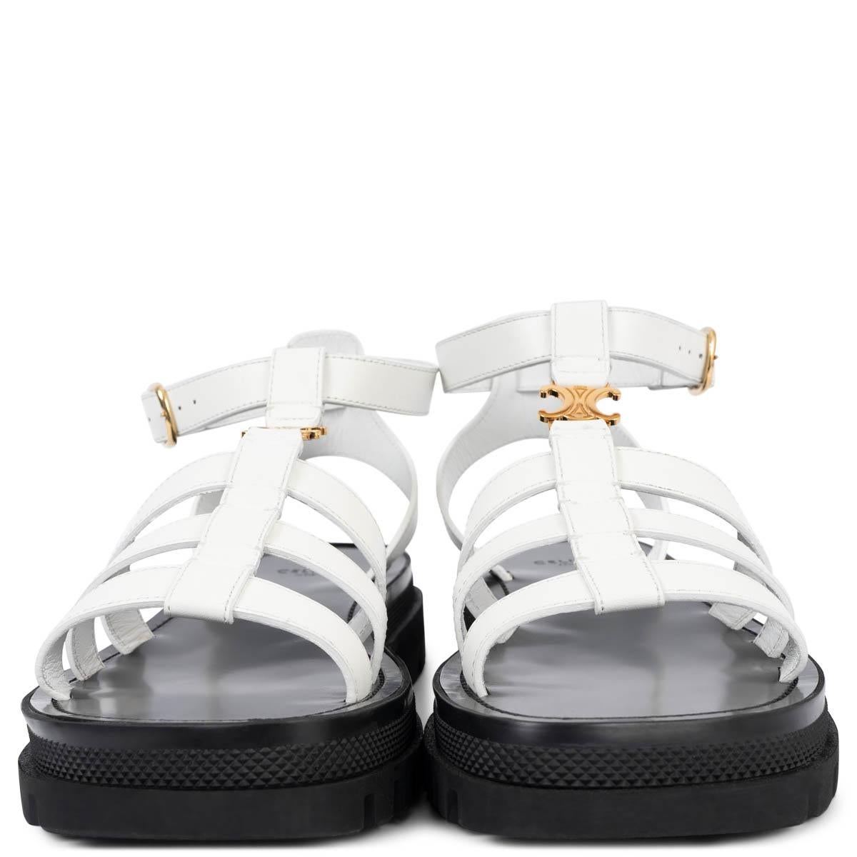 100% authentic Celine Clea Triomphe chunky gladiator sandals in white leather set on a black rubber sole featuring gold-tone hardware. Brand new. Come with dust bags. 

Measurements
Imprinted Size	41 fit 40.5
Shoe Size	40.5
Inside Sole	27.5cm