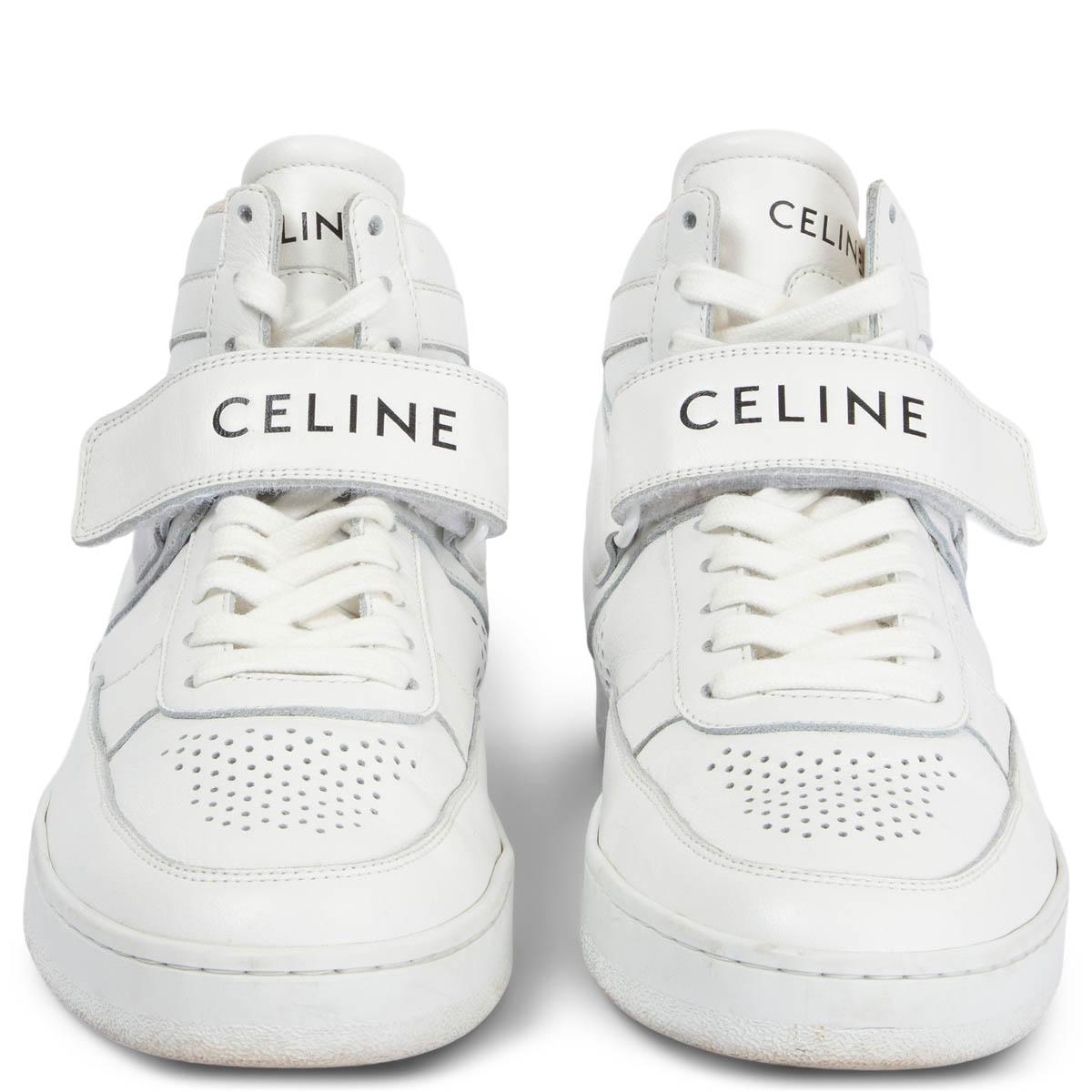 100% authentic Celine CT-03 high-top sneaker in white calfskin with thin perforations on the upper and logo embossed heel and velcro fastening. Celine debossed signature on the external side of the outsole. Side trimmings with graphic lines. White
