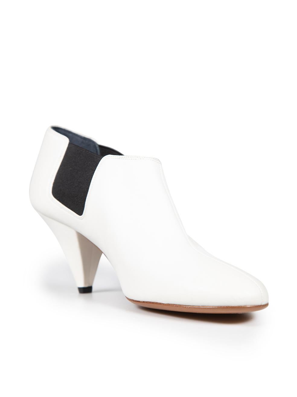 CONDITION is Very good. Minimal wear to the pumps is evident. Abrasion on the toe box, counter and heel on both shoes on this used Céline designer resale item.
 
 
 
 Details
 
 
 White
 
 Leather
 
 Boots
 
 Ankle
 
 Stretch detail on sides
 
